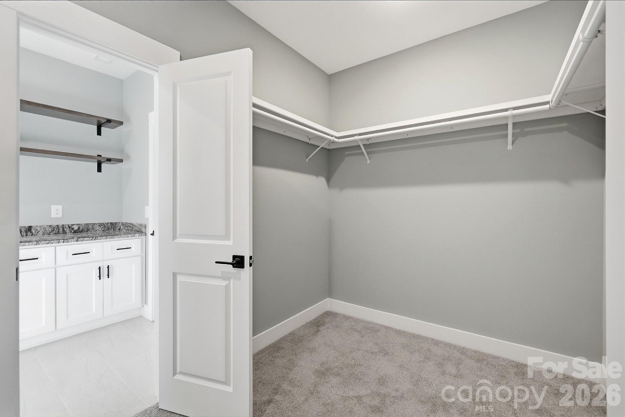 Primary Walk in Closet with Laundry Access - 1860 Twin Lakes Road, Rock Hill