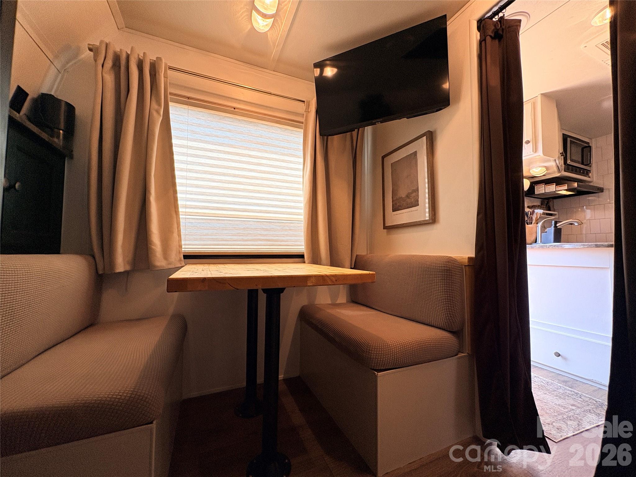 Table in Bunk room could be addional dining, activity table or even an "office" - 221 Grand View Drive, New London
