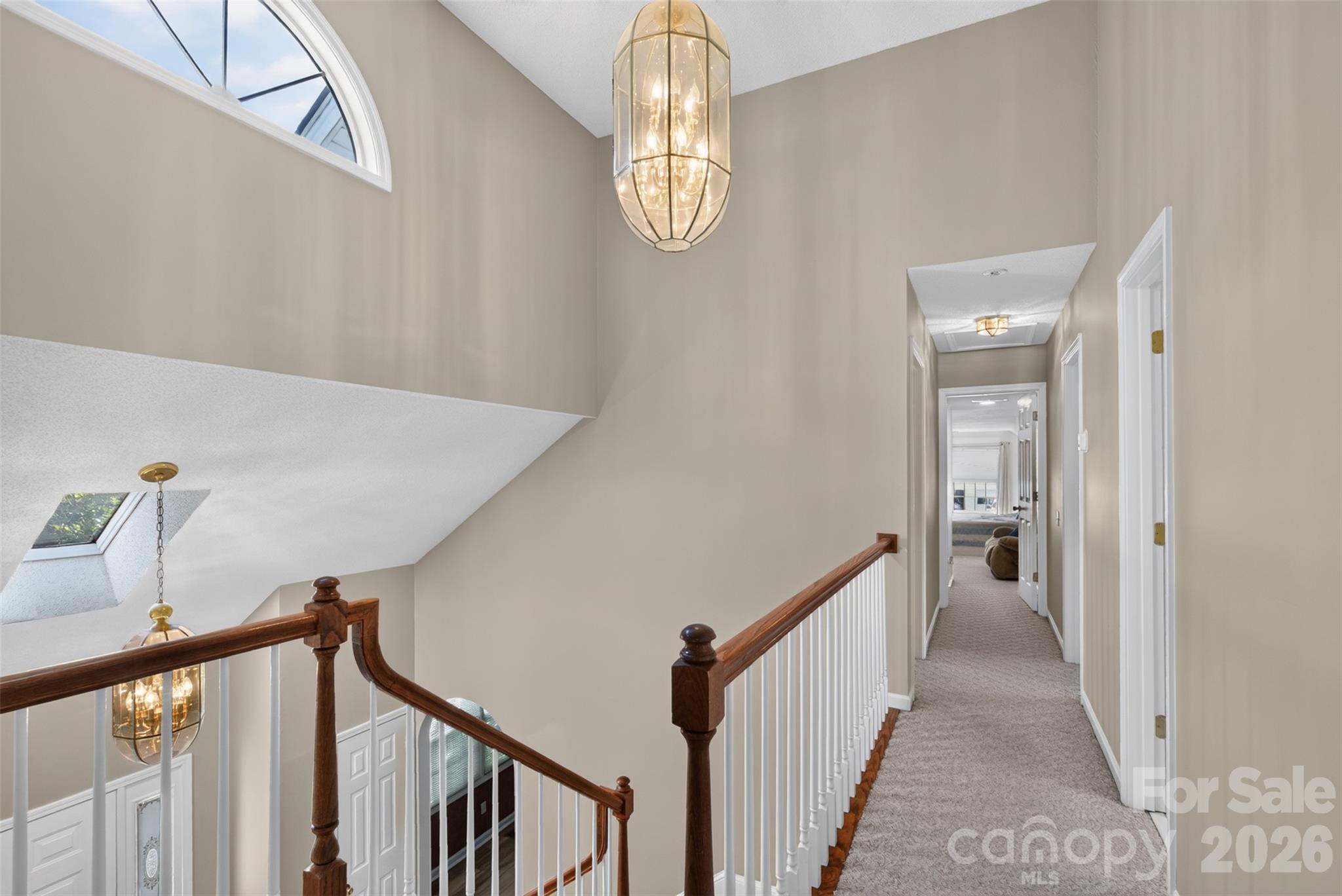 Hall above entry foyer, looking toward additional bedrooms - 69 Sunwest Drive, Arden