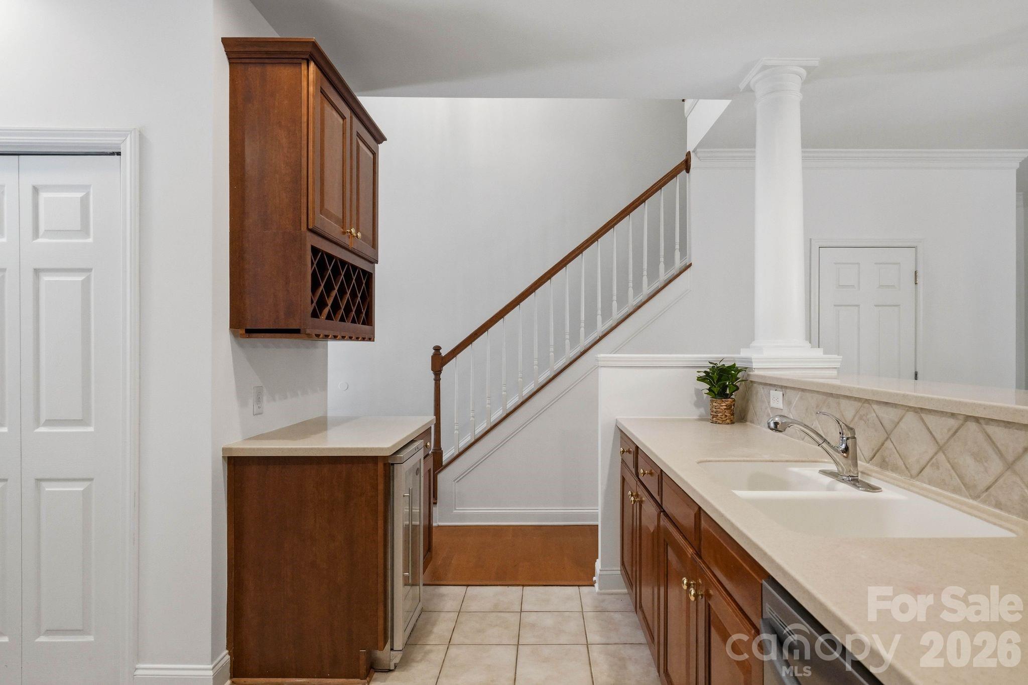 Dedicated beverage and wine area adds convenient serving and storage space. - 18810 Cloverstone Circle, Cornelius