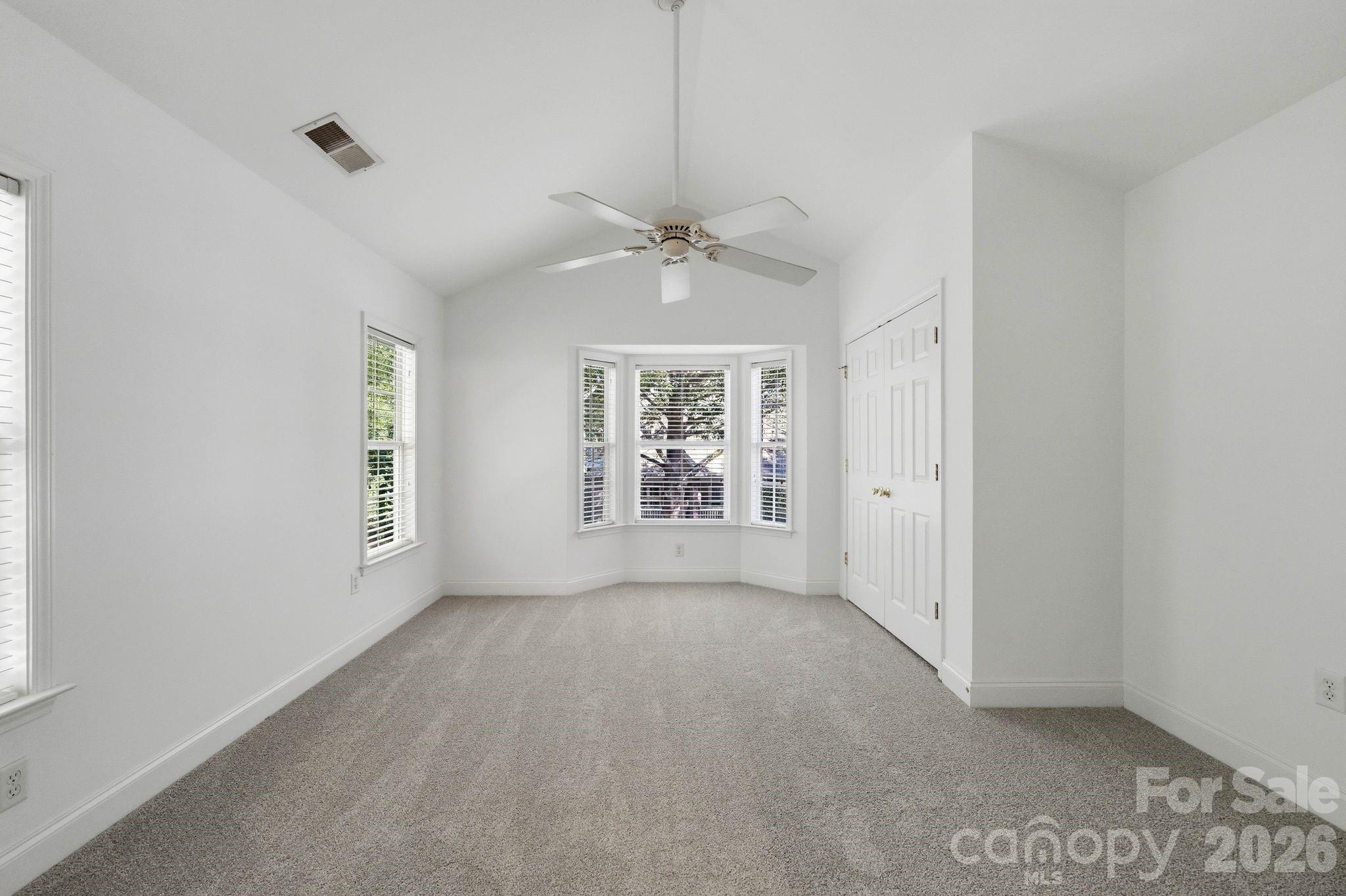 Second upstairs bedroom offers a bright, flexible layout with plenty of usable space. - 18810 Cloverstone Circle, Cornelius