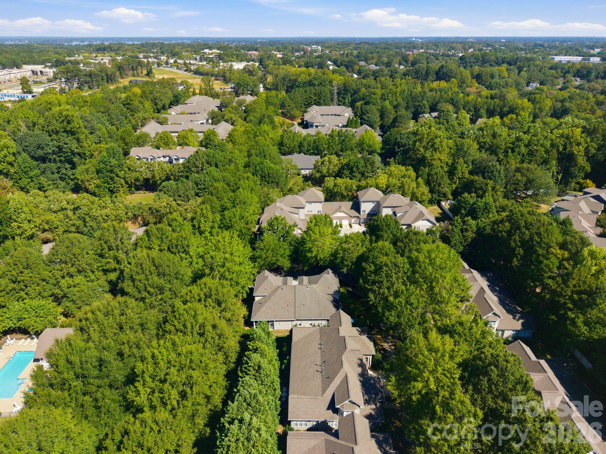 Enjoy community amenities including a neighborhood pool and sidewalks. - 18810 Cloverstone Circle, Cornelius