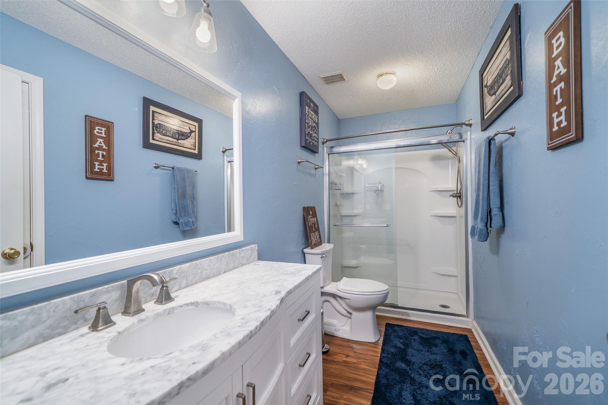 2nd bathroom with walk in shower. access from hallway and 3rd bedroom - 18 Friendly Way, Asheville