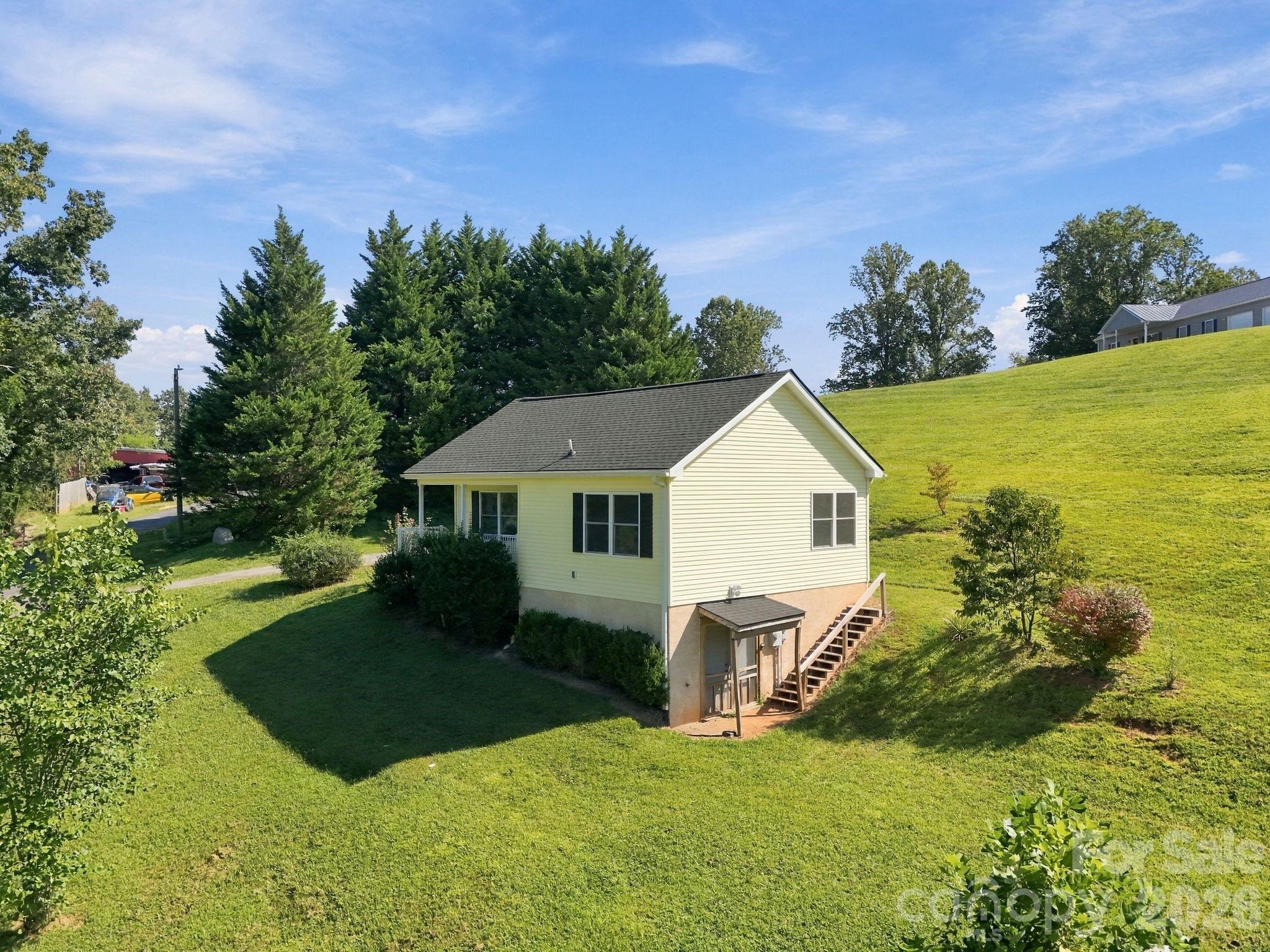 Single Family Residence at 117 Ho Hum Way, Leicester, photo 2 of 38