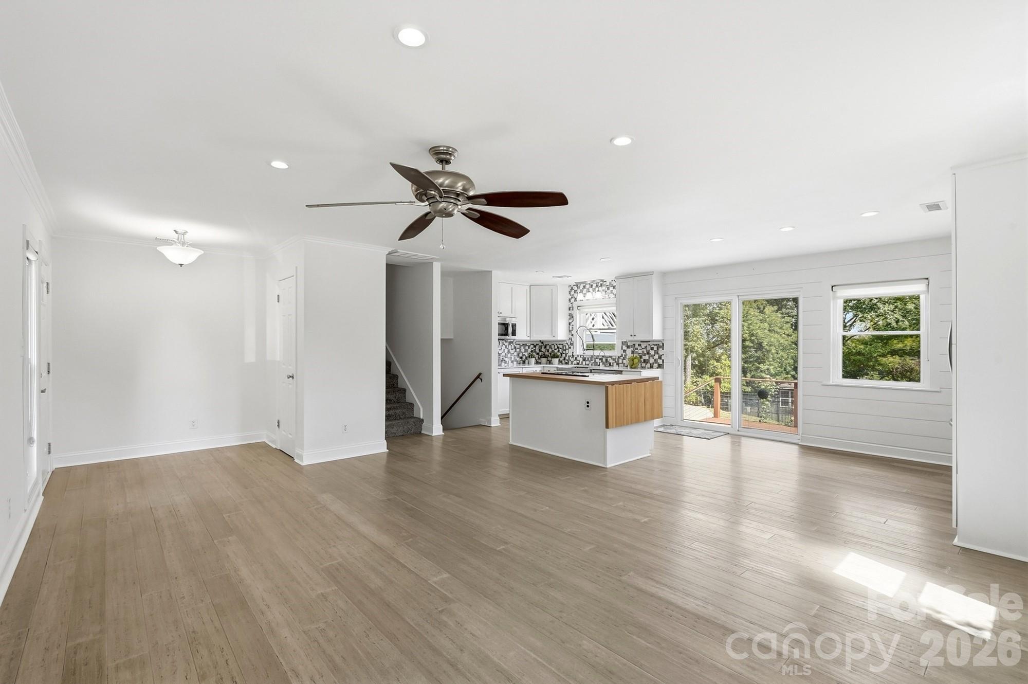 Beautiful LVP flooring throughout the main level adds a sophisticated, modern touch while offering the durability and easy maintenance today's buyers love. - 3022 Point Clear Drive, Tega Cay