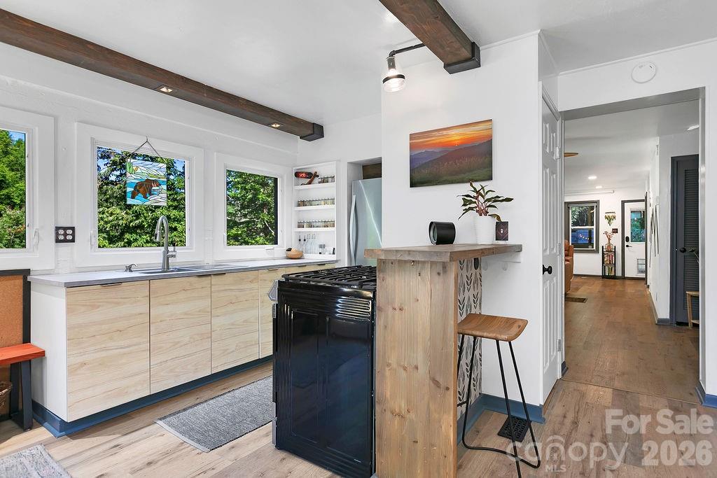 Breakfast bar and Laundry Closet with Door - 354 King Road, Pisgah Forest