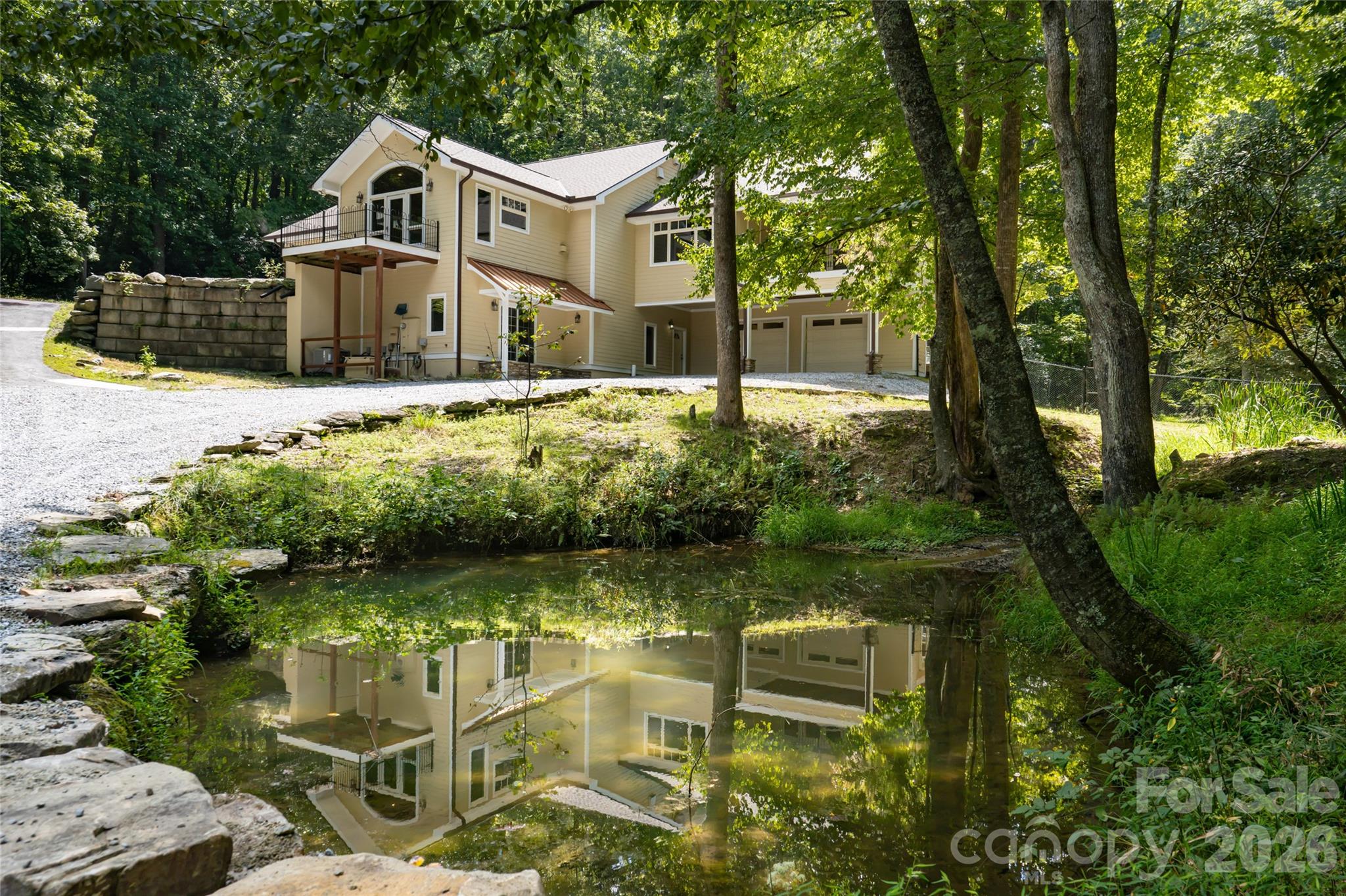 Pond looking towards main residence - 3999 Laurel Park Highway, Hendersonville