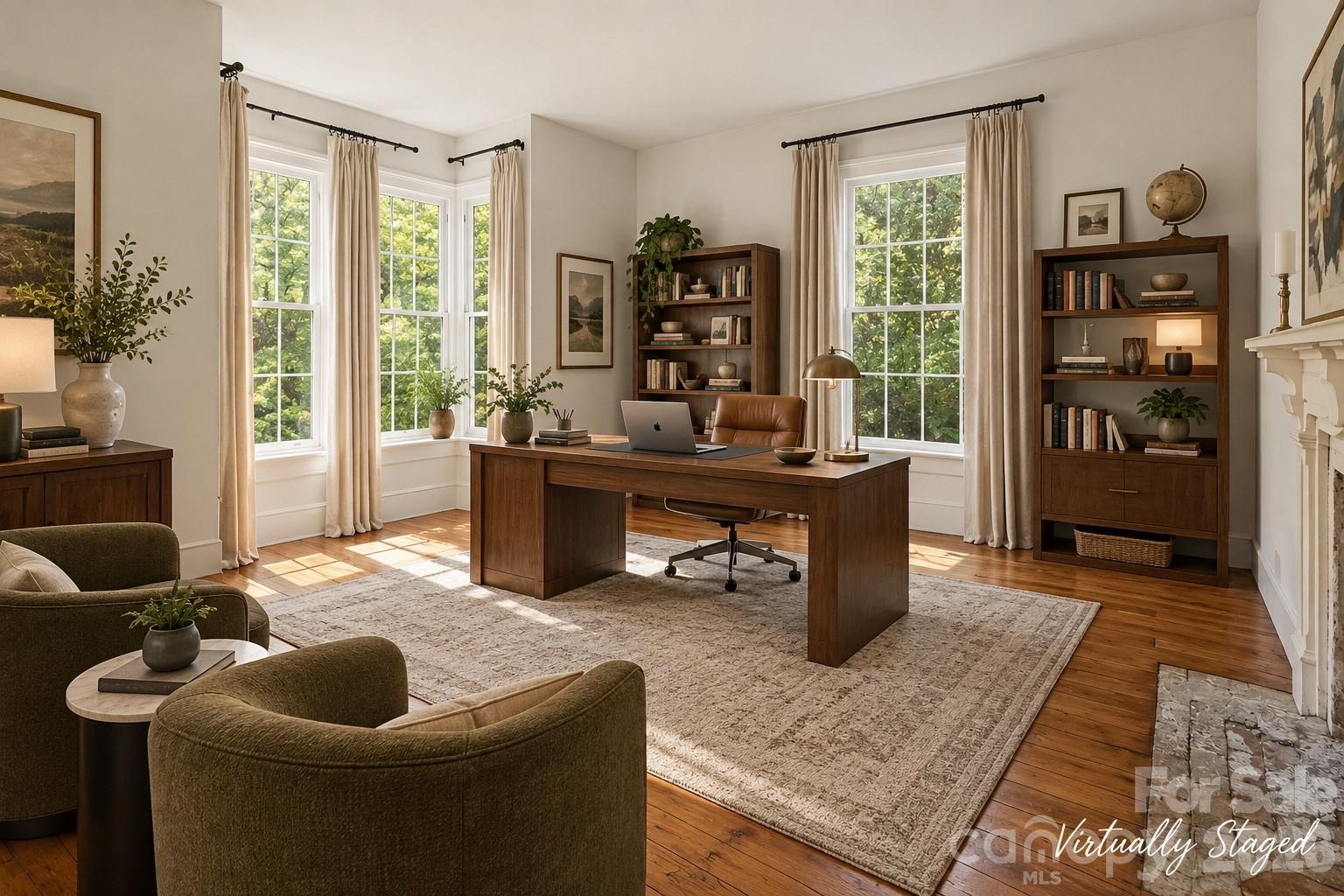 Living room, office or "Parlor" has the most ornate fireplace mantle of the 8 fireplaces all with original wood mantles.Wide plank hardwood floors throughout both original and matching in the renovated areas and/or additions - 10915 Beatties Ford Road, Huntersville