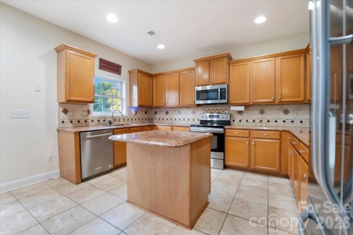Kitchen with stainless appliances. - 144 Steeplechase Avenue, Mooresville