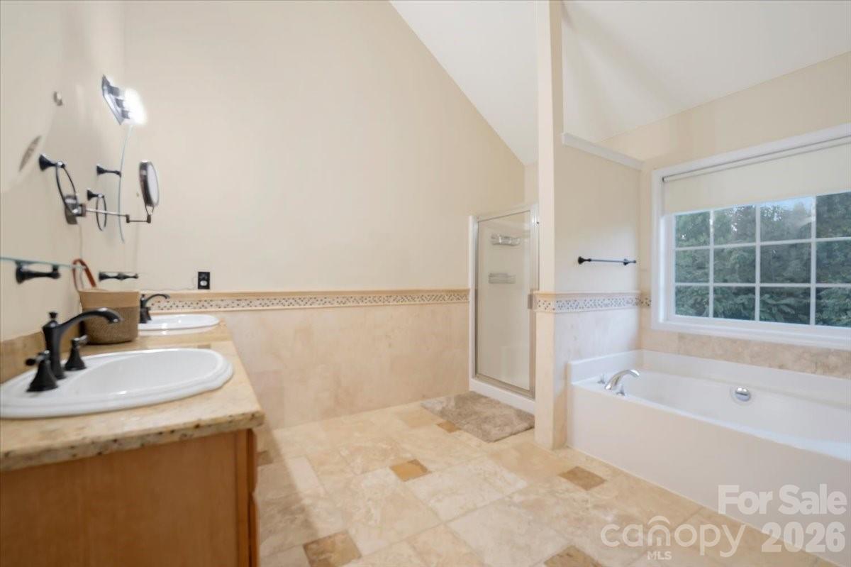 Primary bathroom with seperate tub and shower. - 144 Steeplechase Avenue, Mooresville