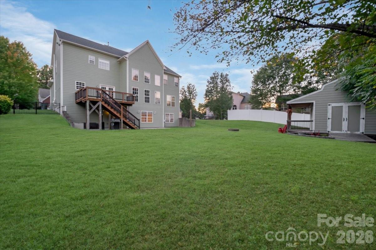 Spacious backyard offering plenty of room to play and entertain. - 144 Steeplechase Avenue, Mooresville