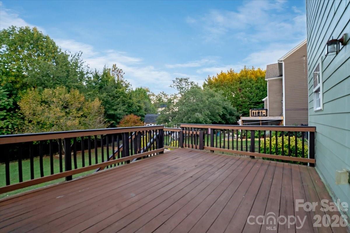 Enjoy outdoor living on the spacious deck. the perfect spot for your morning coffee. - 144 Steeplechase Avenue, Mooresville