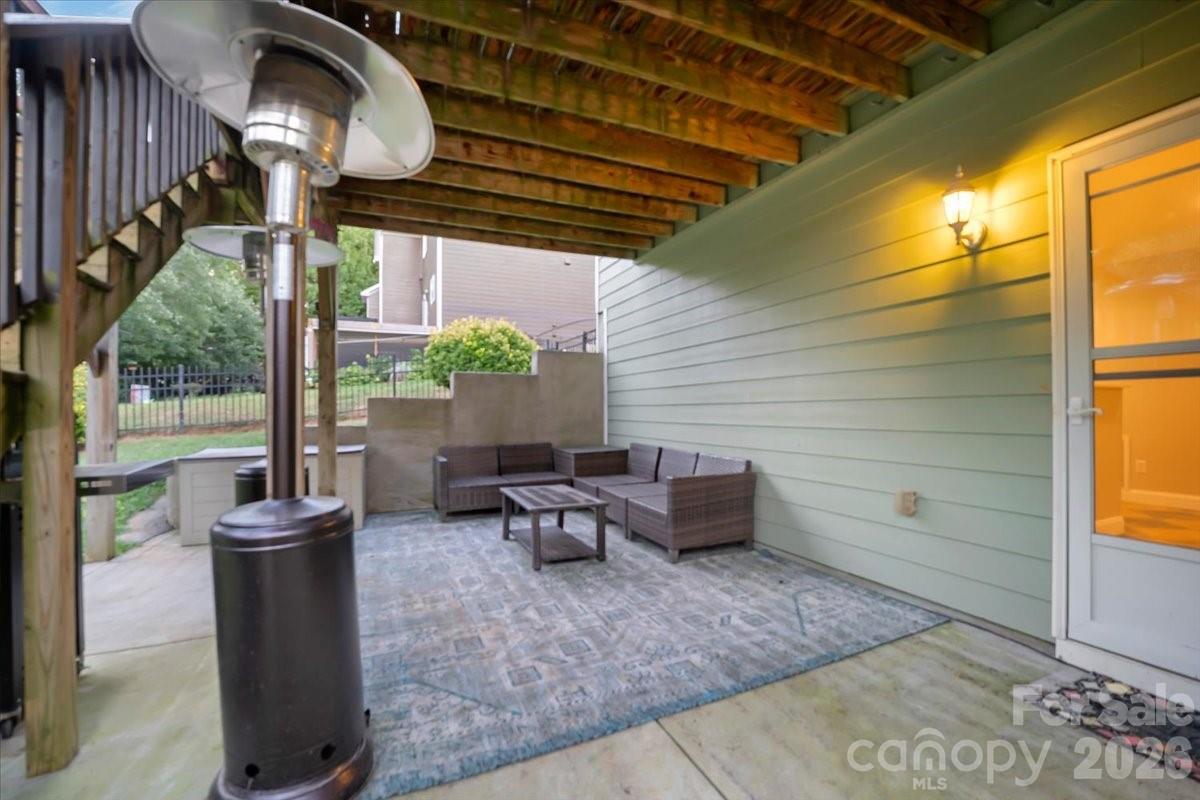 Back patio offers the perfect spot for grilling outdoors. - 144 Steeplechase Avenue, Mooresville