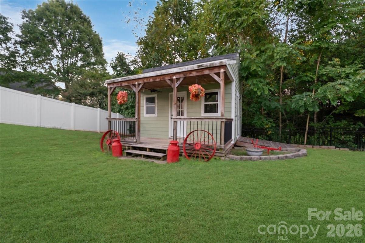Charming backyard shed that adds both function and character. - 144 Steeplechase Avenue, Mooresville