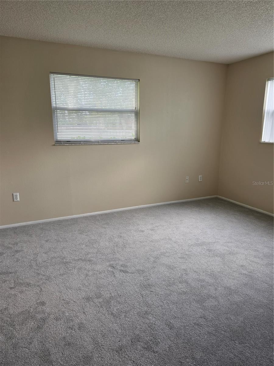 Primary Bedroom freshly painted - 4140 PASSPORT LN #101, NEW PORT RICHEY