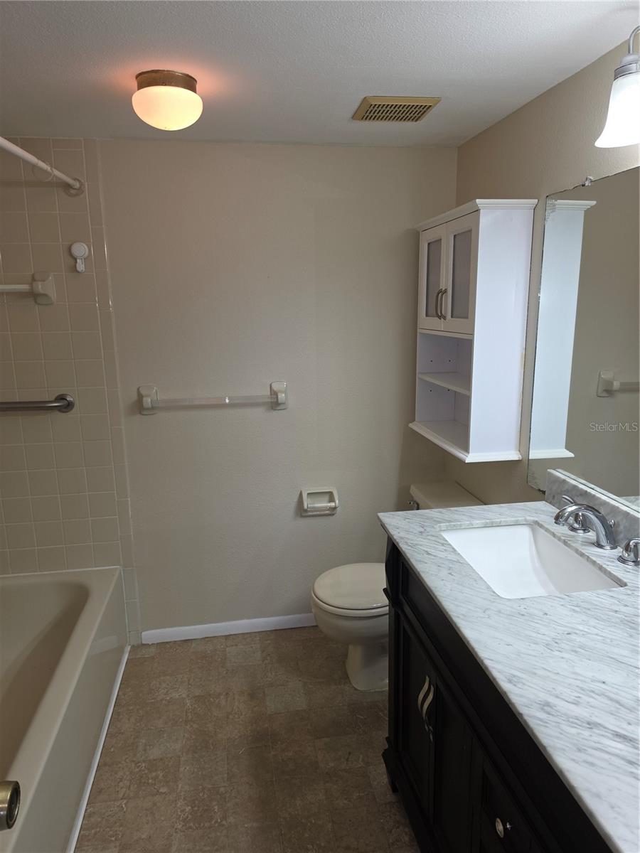 Primary Bathroom freshly painted - 4140 PASSPORT LN #101, NEW PORT RICHEY