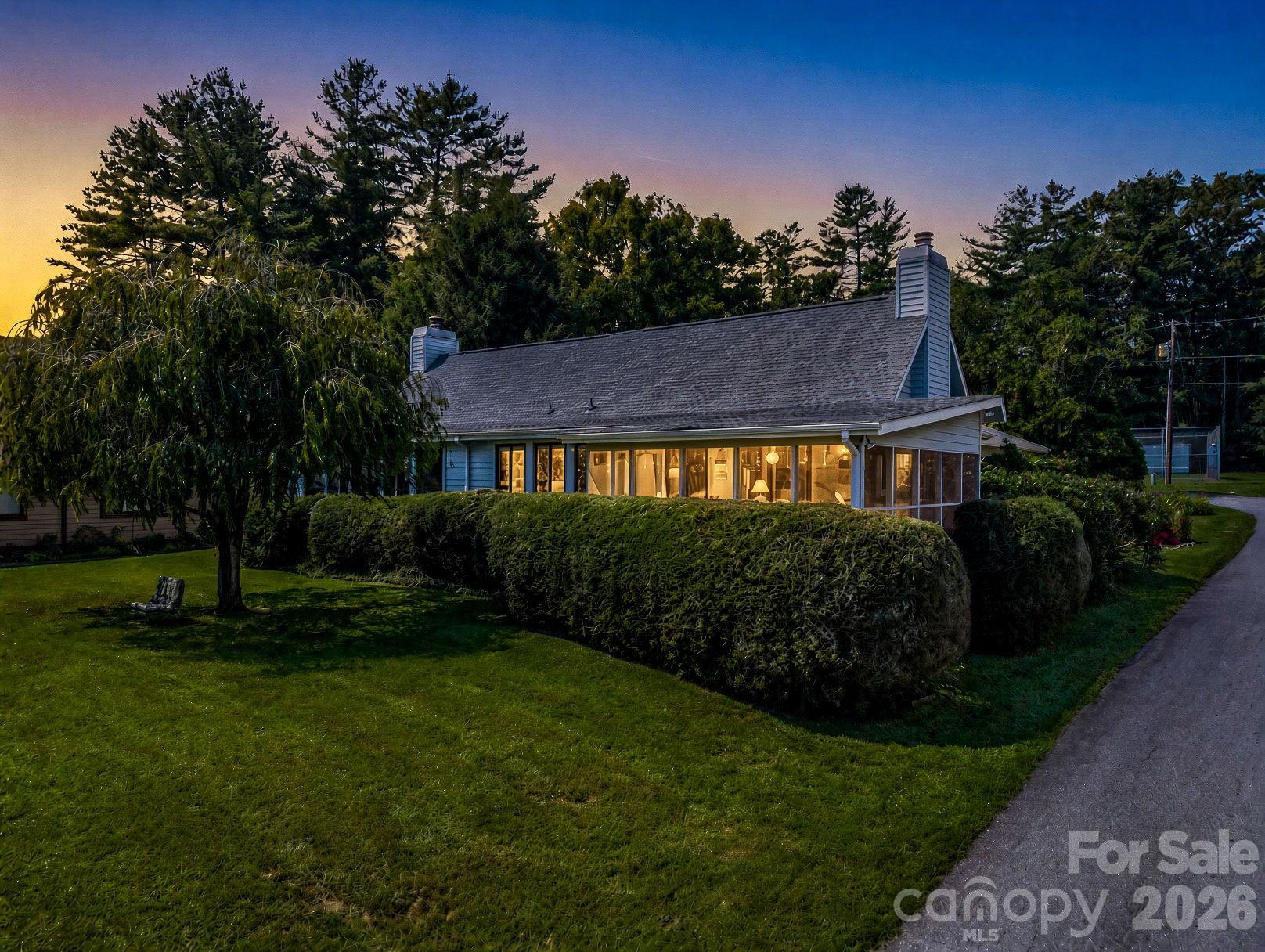 Twilight photo of front of the home - 31 Willow Way, Hendersonville