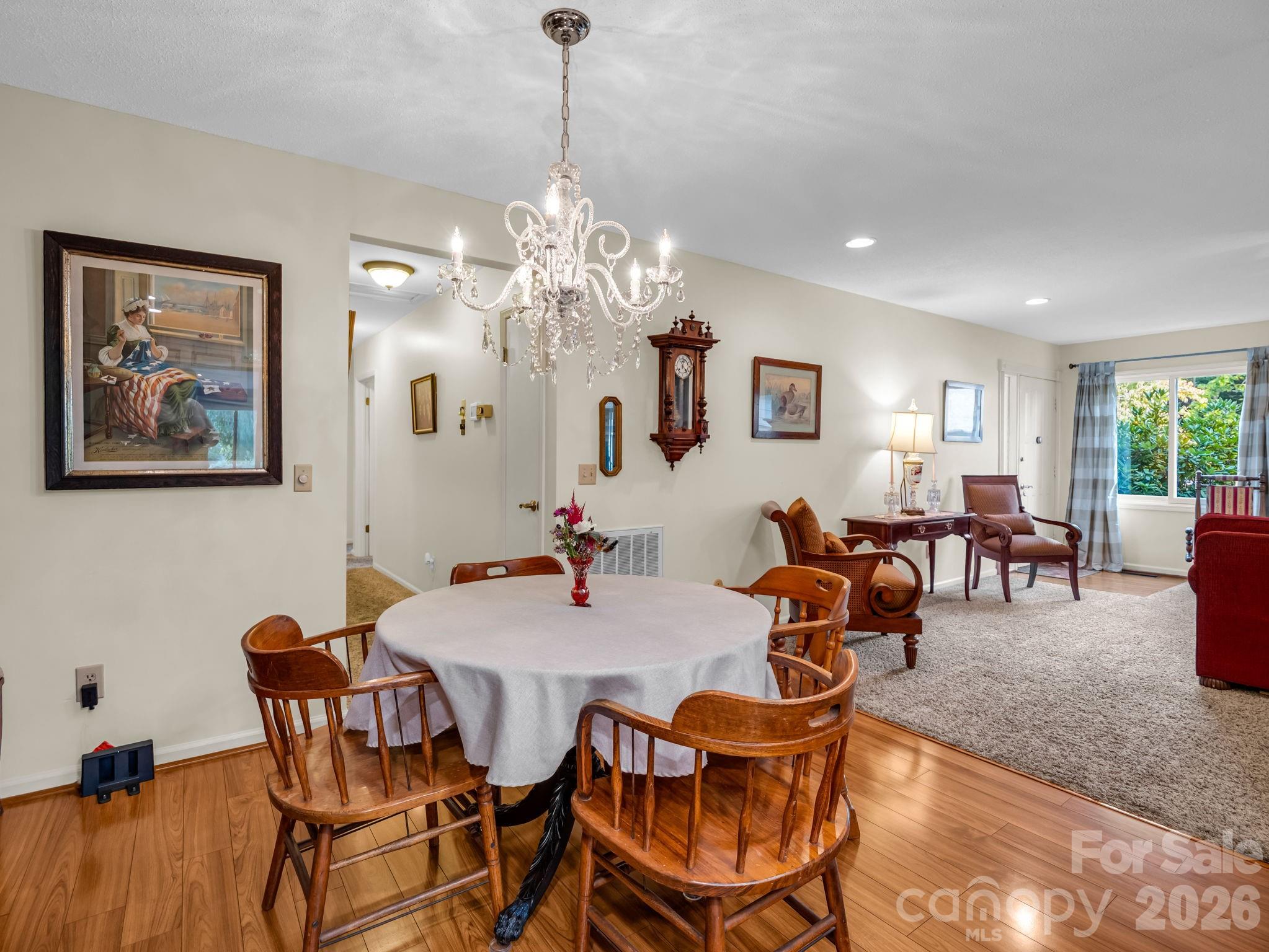 View from kitchen into dining room and living room - 31 Willow Way, Hendersonville