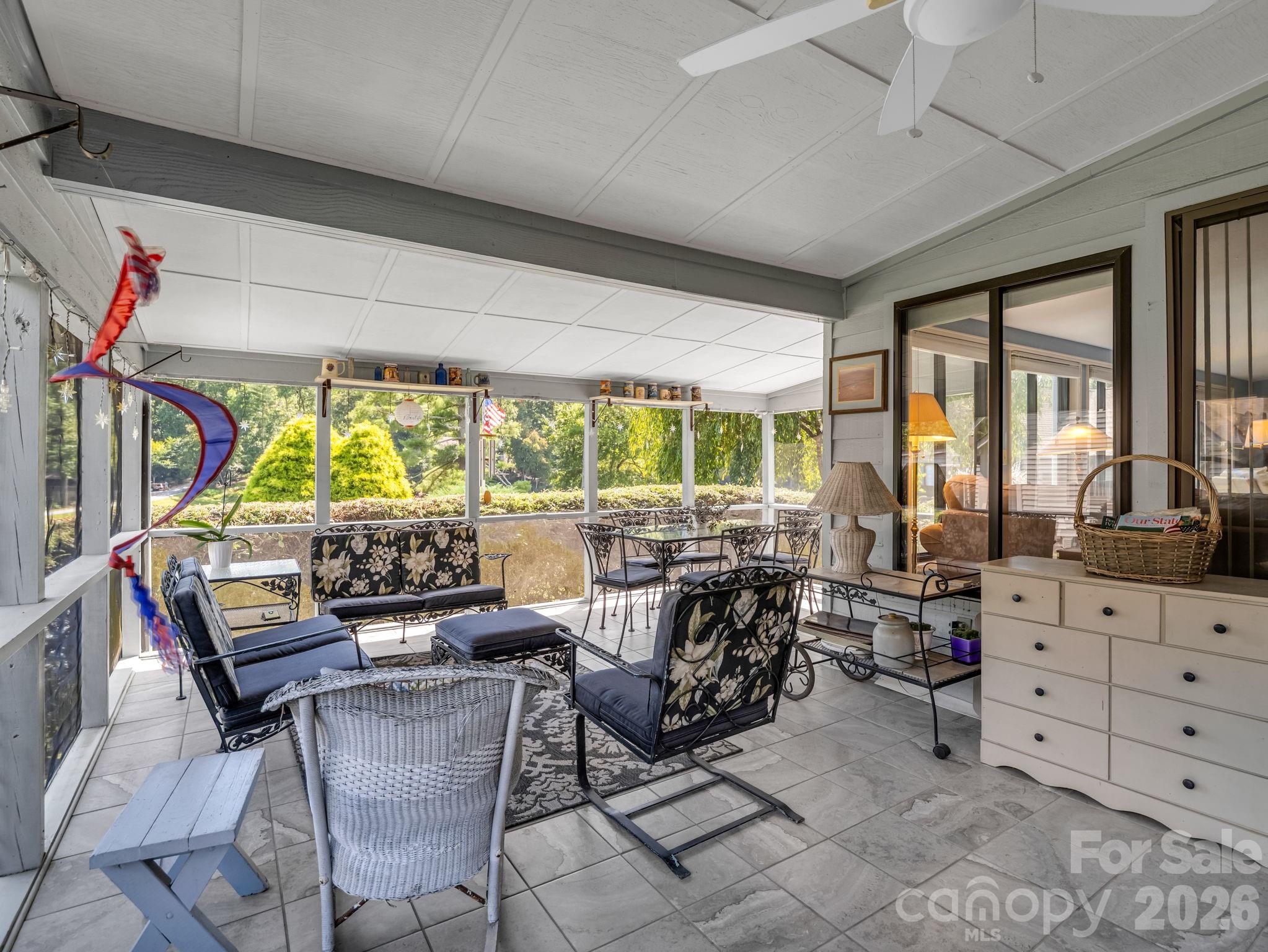 Screened-in porch overlooking the lake - 31 Willow Way, Hendersonville
