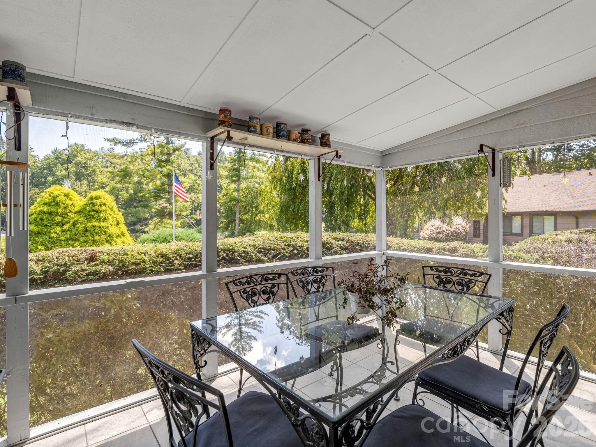 Southeastern lake views from the screened in porch - 31 Willow Way, Hendersonville