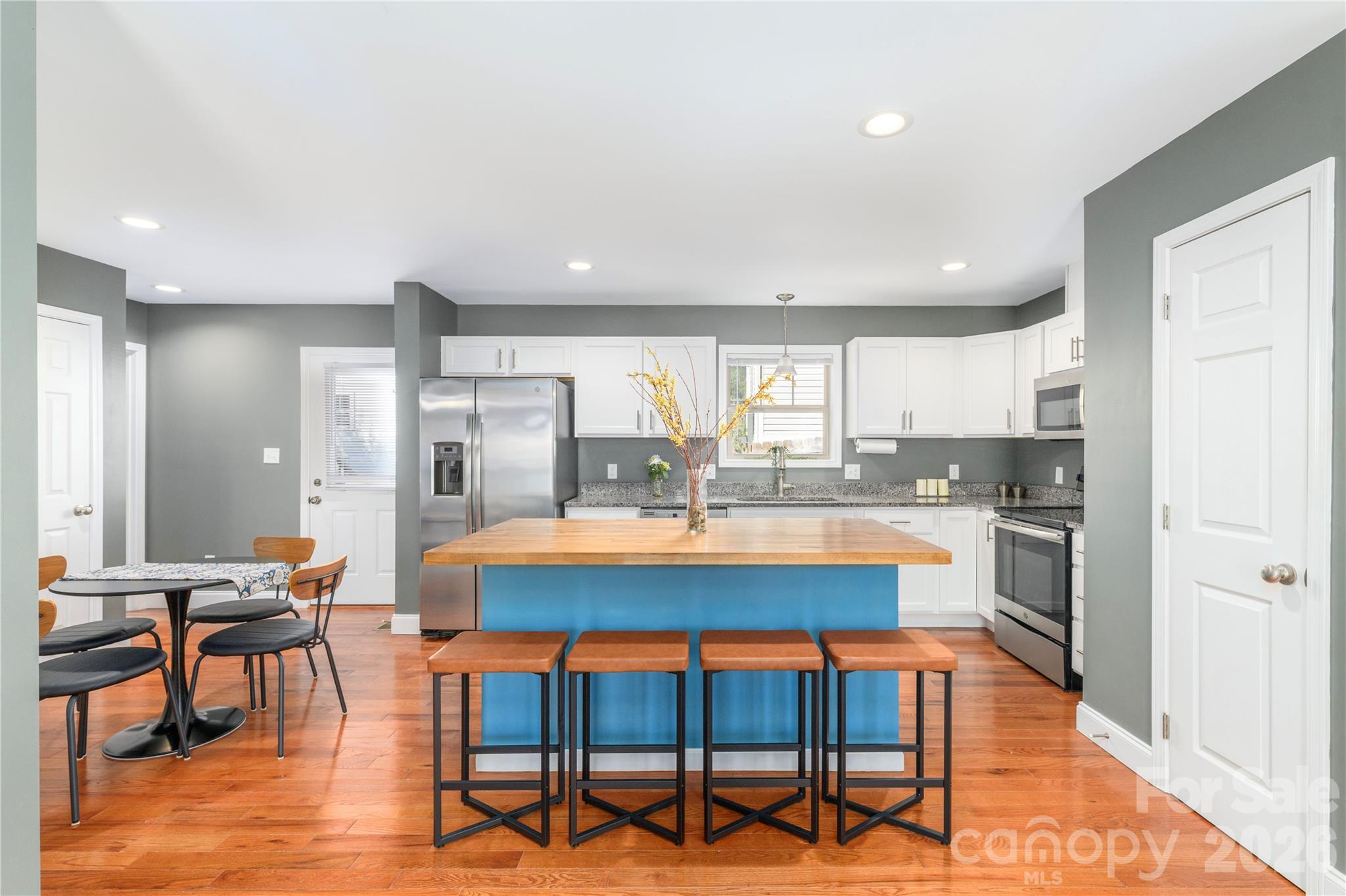 Custom breakfast bar island w lots of seating - 5 Declan Drive, Weaverville