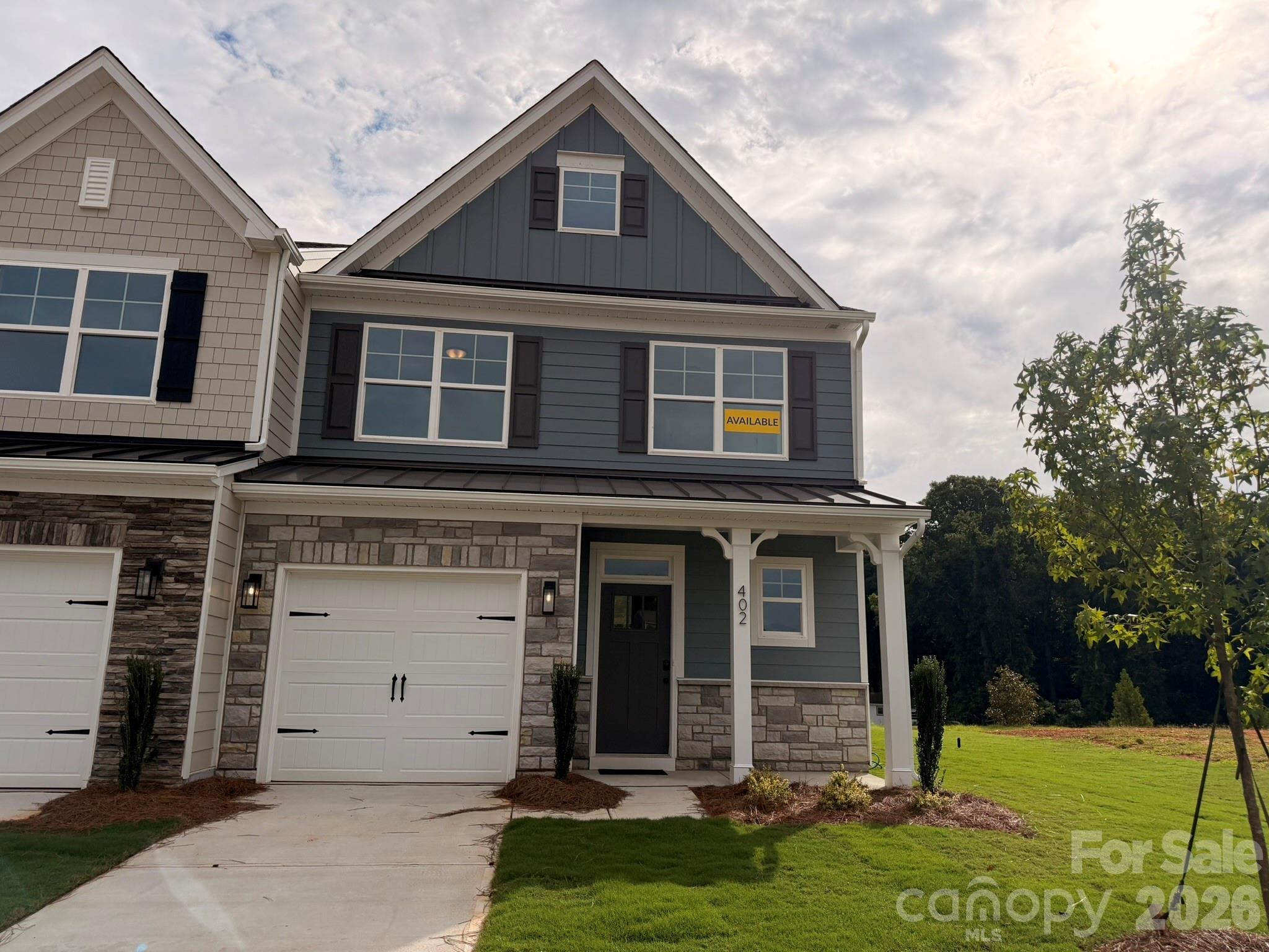 Homesite 104 features a Cary H floorplan - 402 Blythe Townhome Lane, Waxhaw