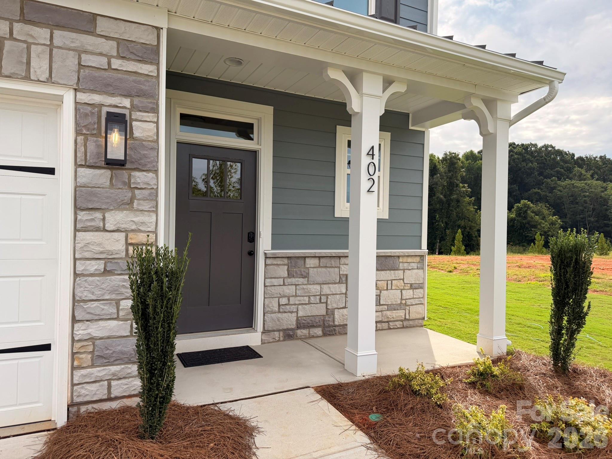 Front porch - 402 Blythe Townhome Lane, Waxhaw
