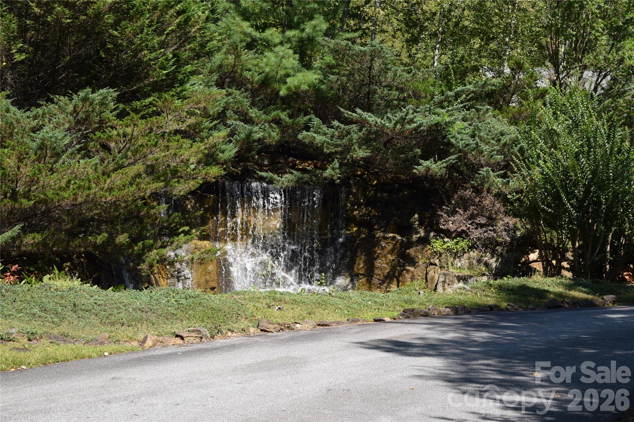 Waterfall across from sign, prior to gate - TBD Preservation Trail, Sylva