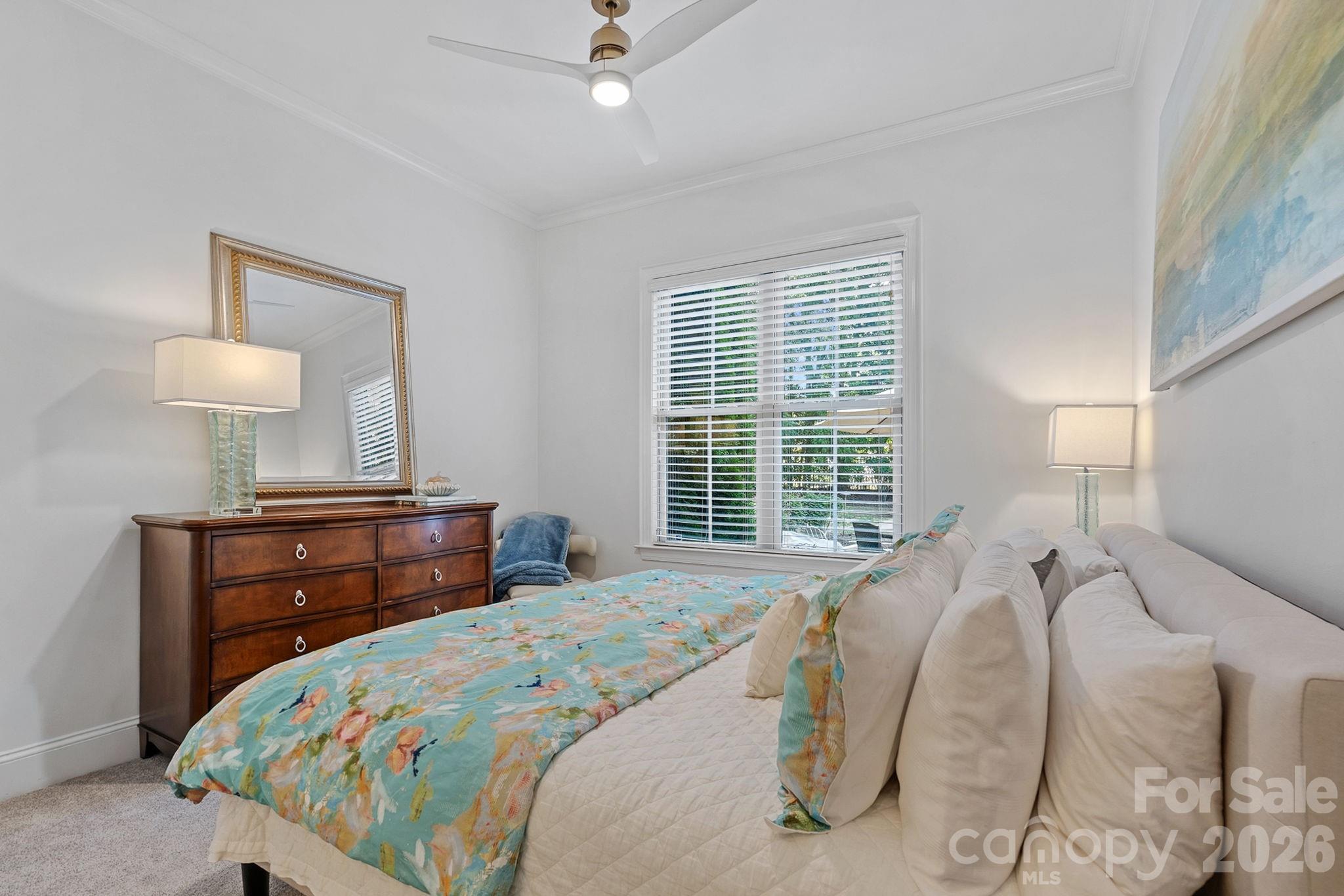 Guest Suite on Main level has attached full bathroom. - 1104 Longwood Court, Matthews