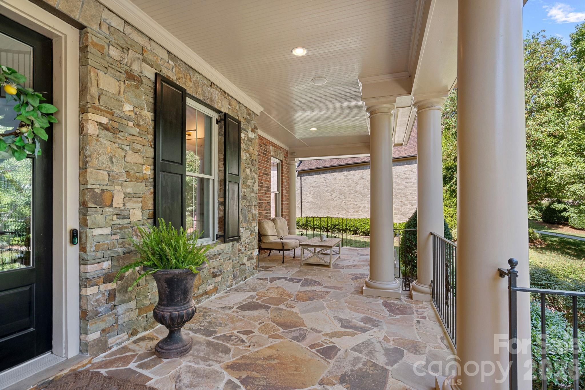 Beautiful front porch made for waving to neighbors. - 1104 Longwood Court, Matthews