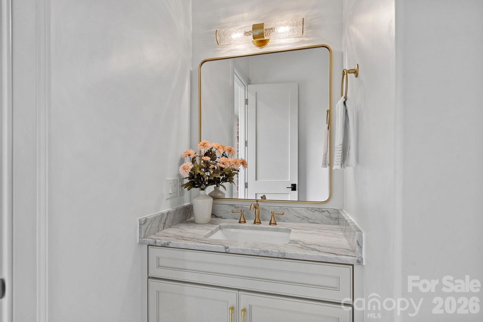 half bathroom downstairs - 7679 Rabbit Circle, Denver