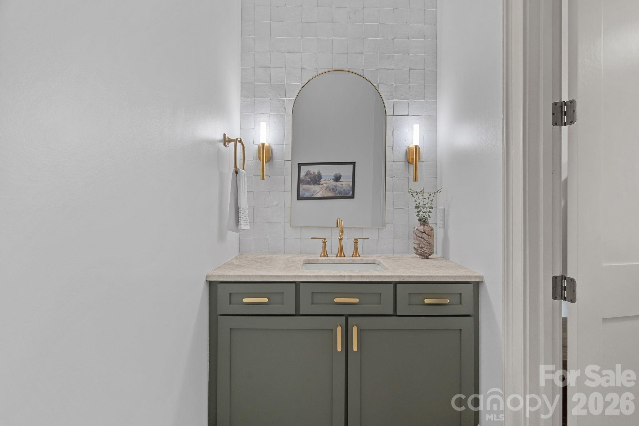 half bathroom off of mudroom - 7679 Rabbit Circle, Denver