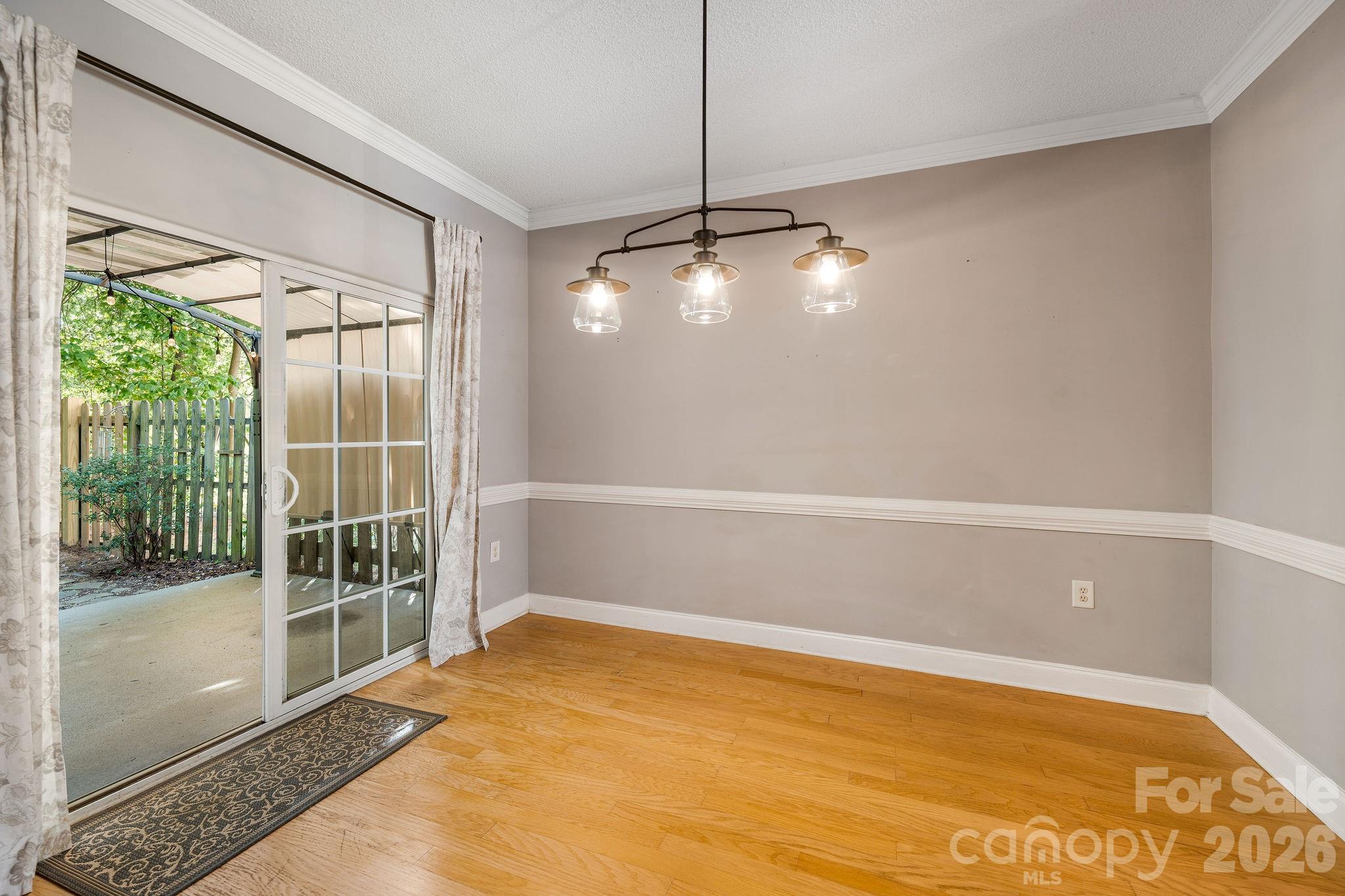 Dining space with outdoor access. - 896 West Pointe Drive, Asheville