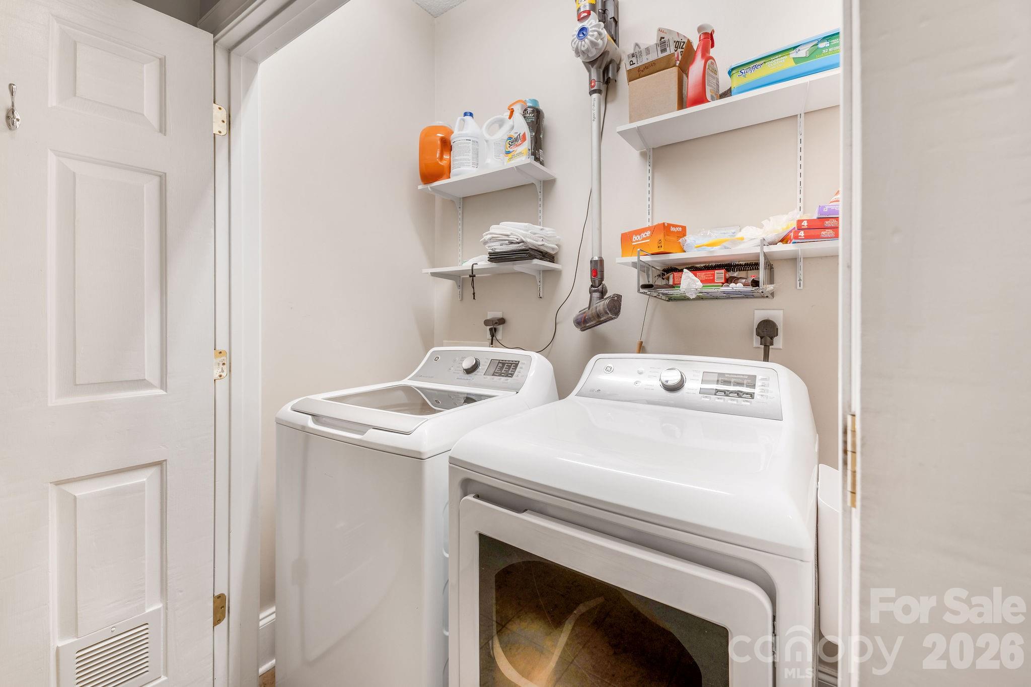 Laundry closet in hallway. - 896 West Pointe Drive, Asheville