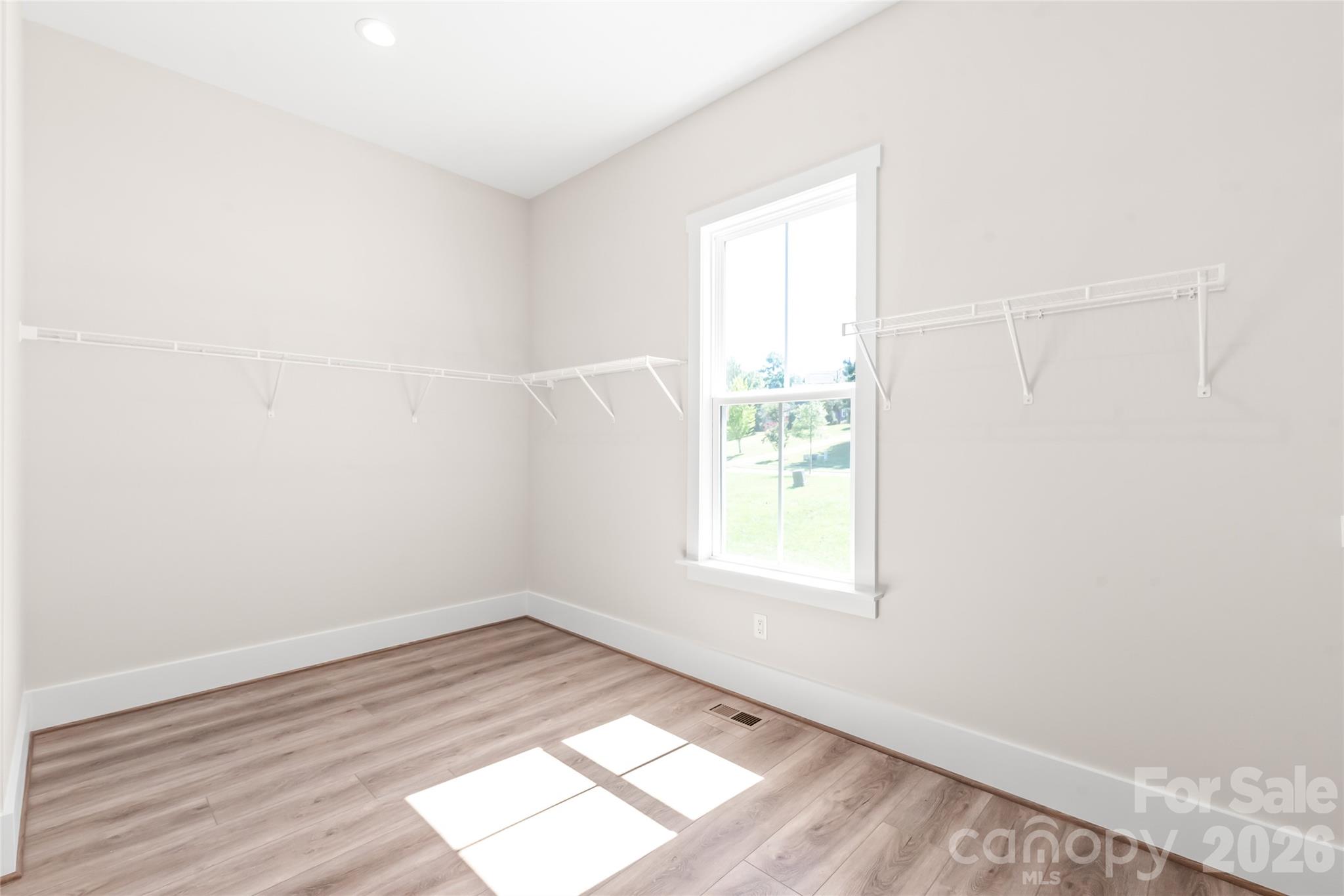 Primary Closet - 179 Chaska Loop, Troutman