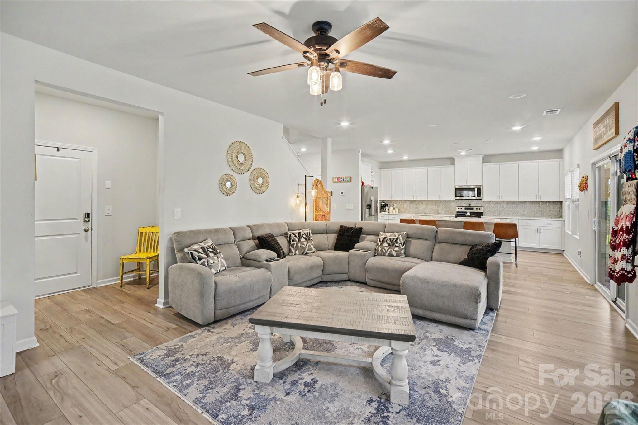 The open great room flows right into the kitchen. - 1623 Baymont Court, Stanley