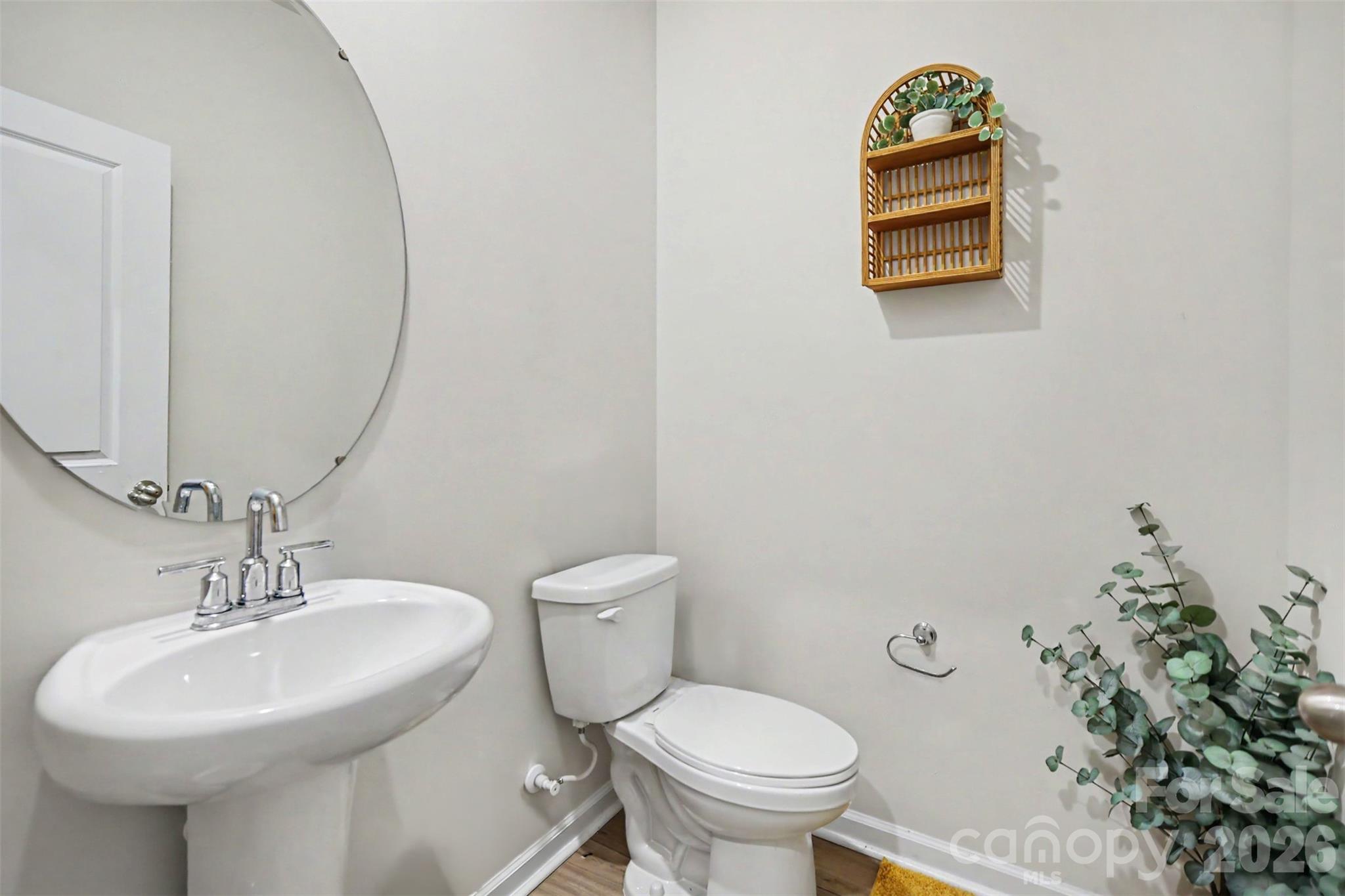 A convenient powder room on the main level. - 1623 Baymont Court, Stanley