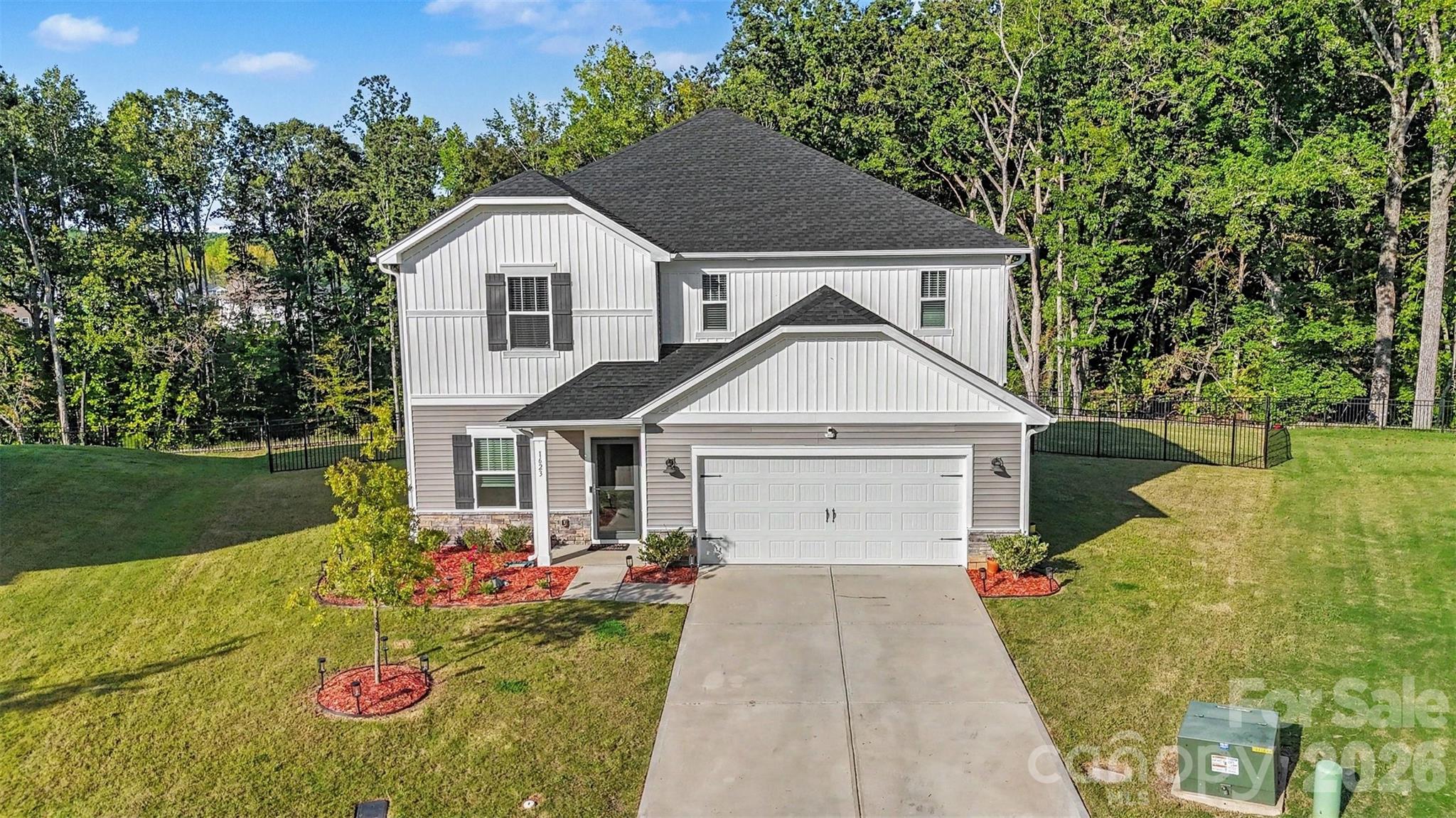 Beautiful curb appeal with mature landscaping. - 1623 Baymont Court, Stanley