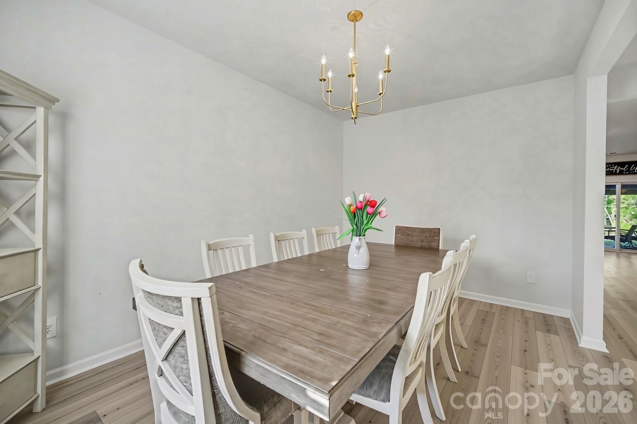 A formal dining room ready for your next gathering. - 1623 Baymont Court, Stanley