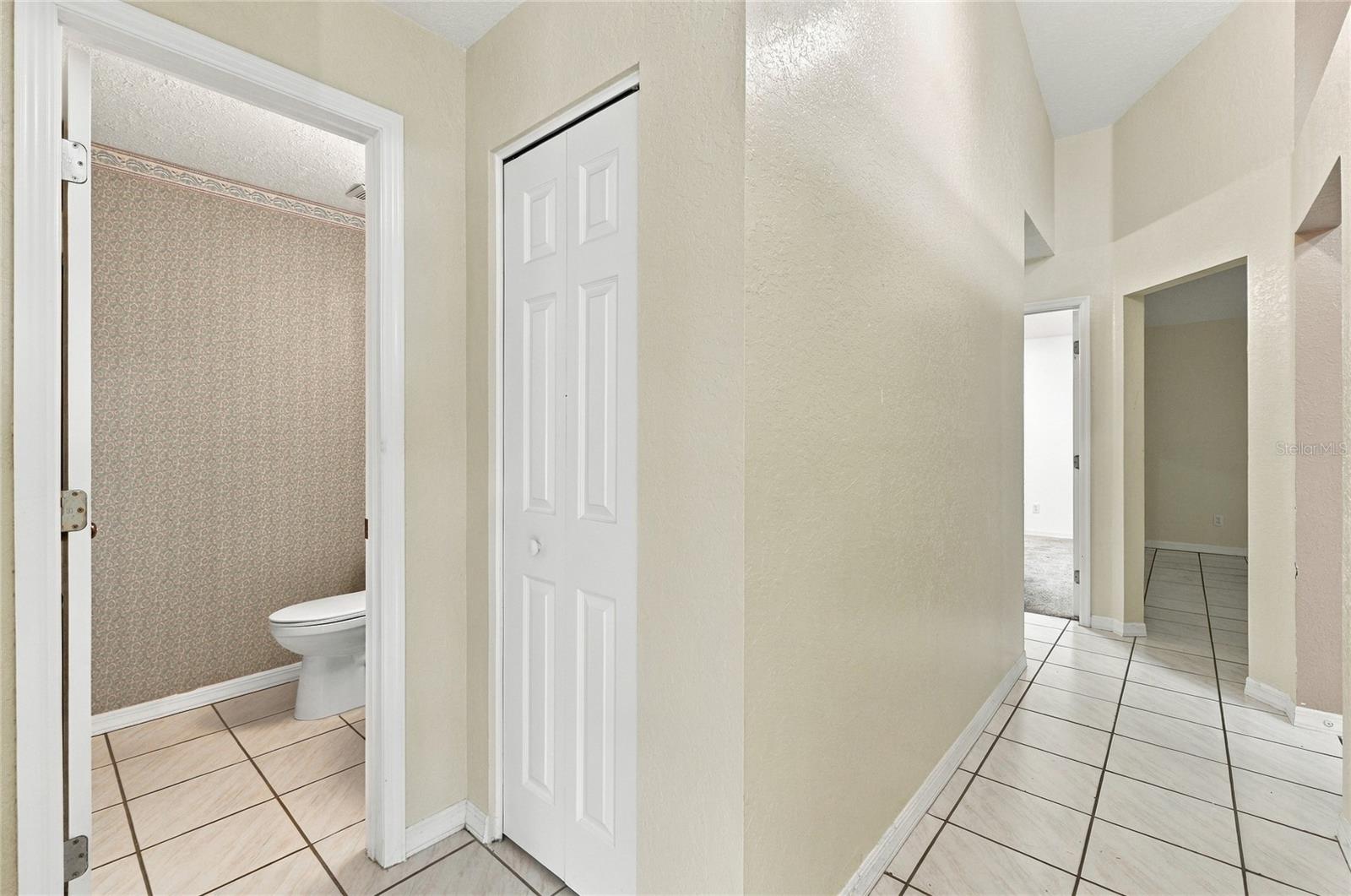 Hallway to Half Bath - 511 MARCIA LOOP, WINTER HAVEN