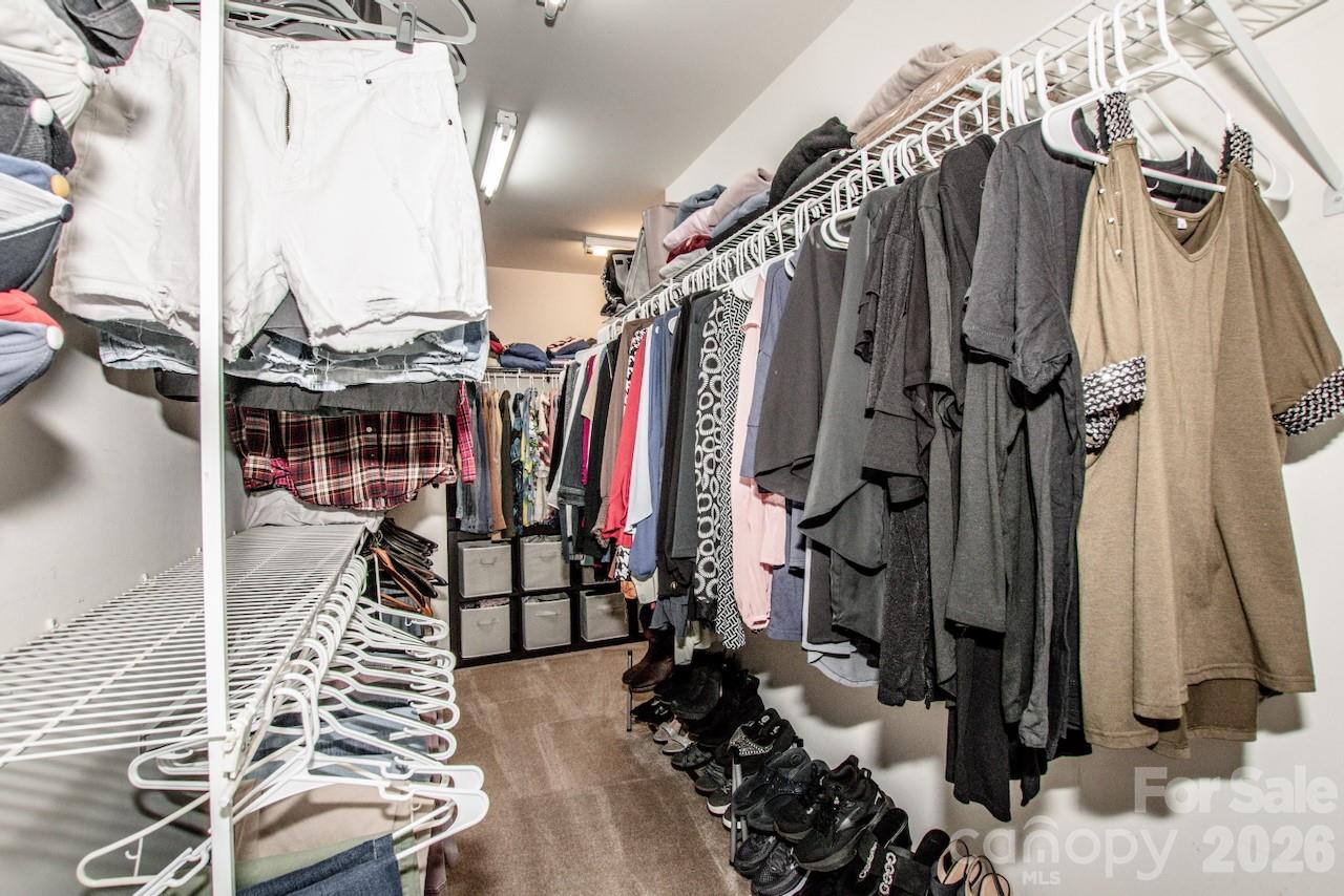 Oversize L shaped primary closet with attic access - 111 Comata Road, Mooresville