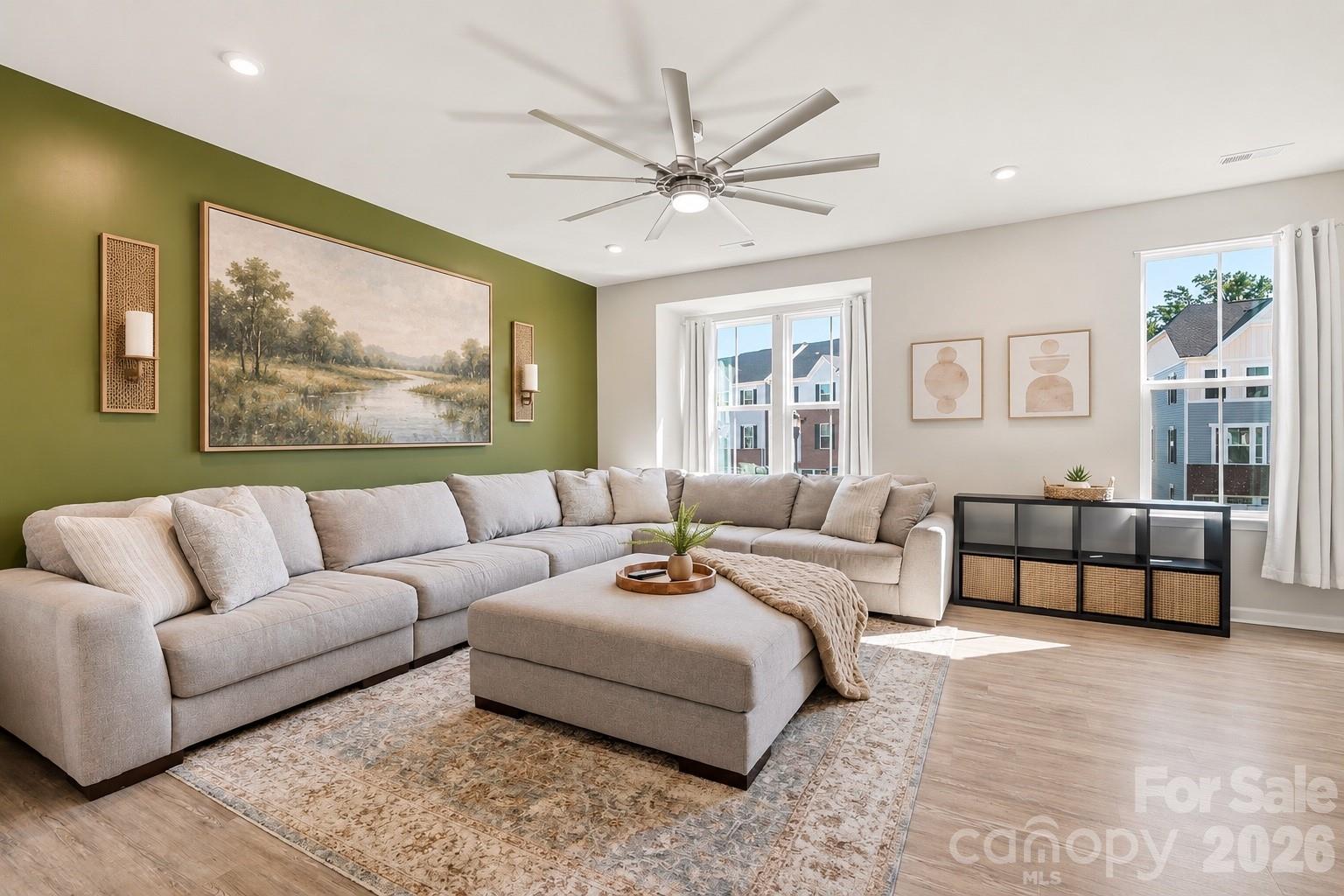 Virtually staged wall art on green wall. The wall is more sage green in person. - 2606 Grantham Place Drive, Fort Mill