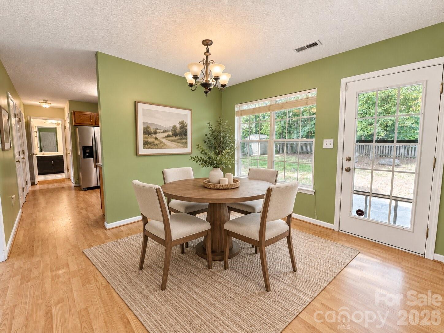 Virtual staged dining room - 4075 Zebulon Avenue SW, Concord