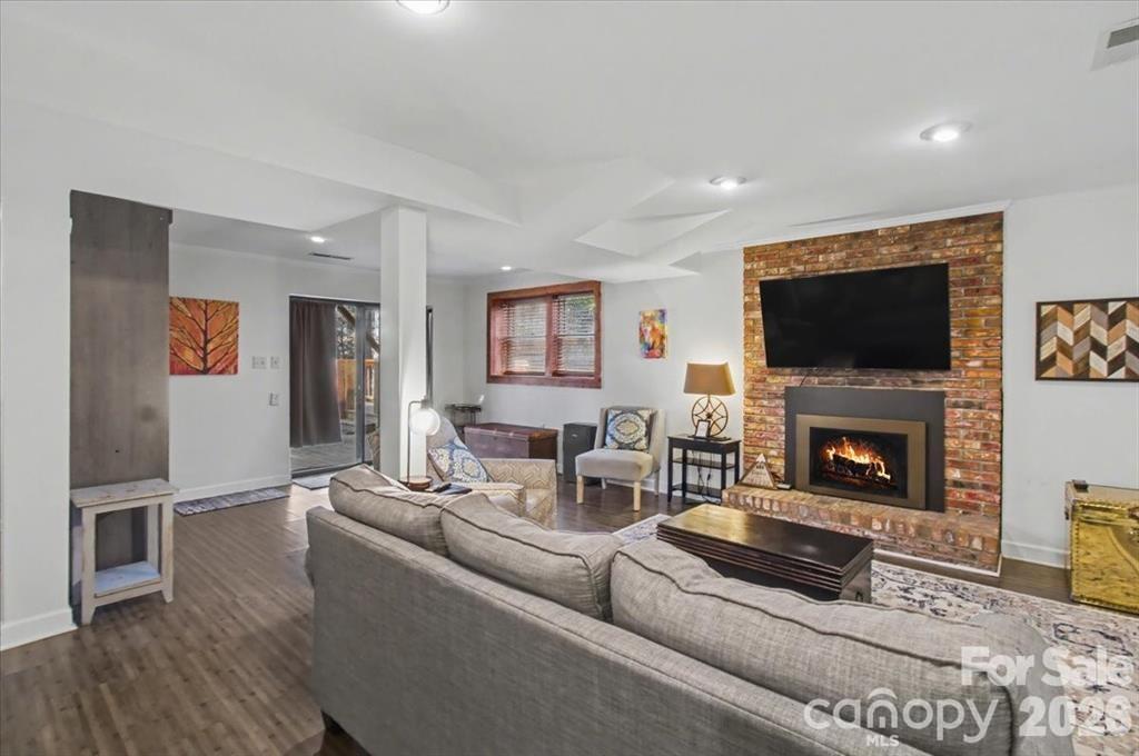 Bonus Room downstairs with gas fireplace - 30 Whippoorwill Drive, Weaverville