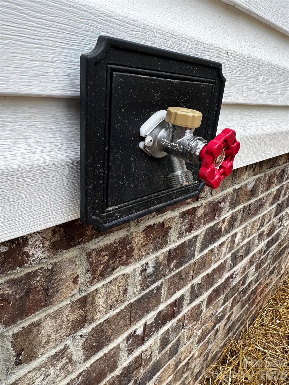 Exterior faucet located at rear of home - 105 Cottontail Lane, Statesville