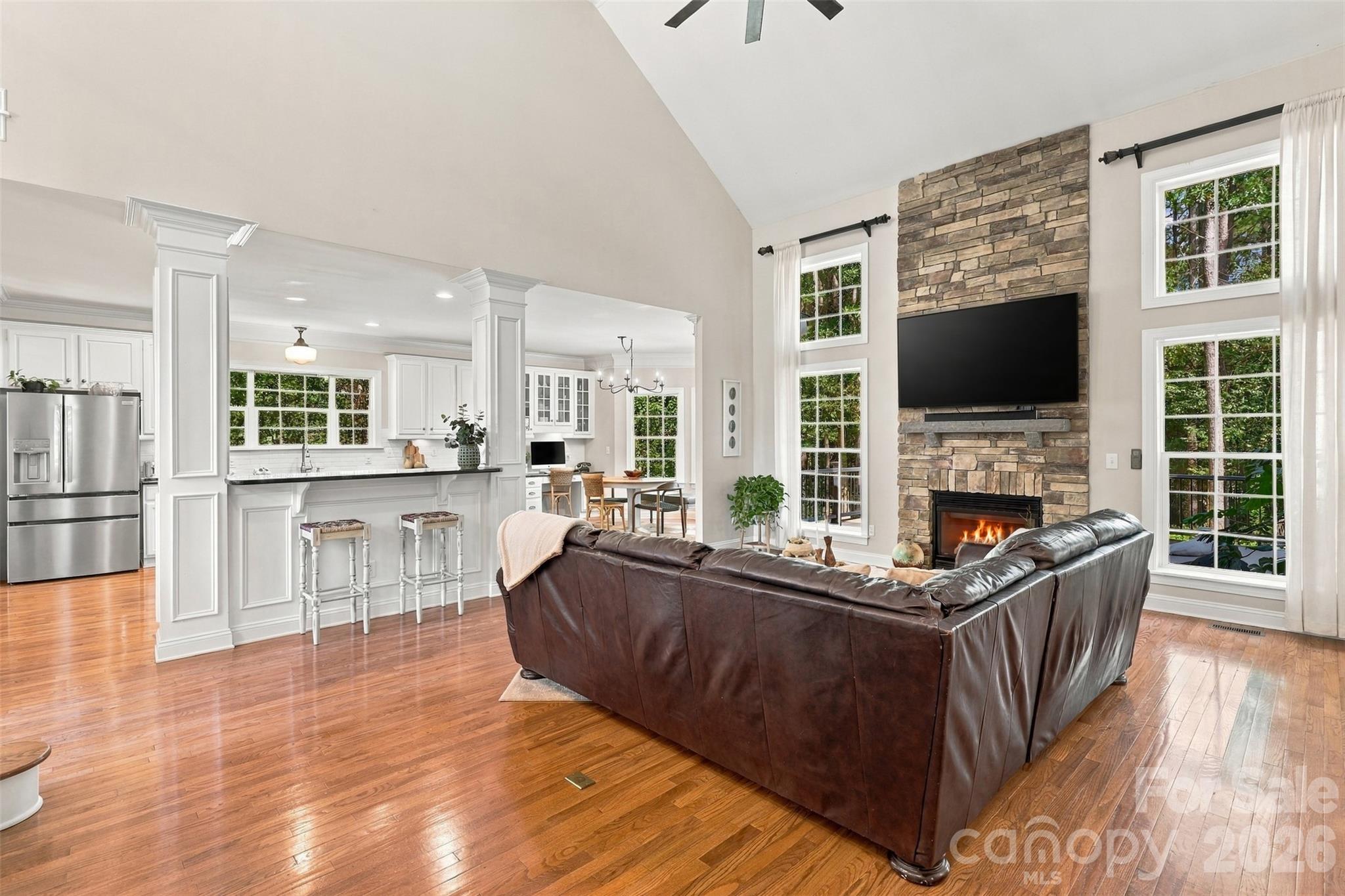 Open Living Room with Stone Fireplace - 3105 Stanway Court, Waxhaw