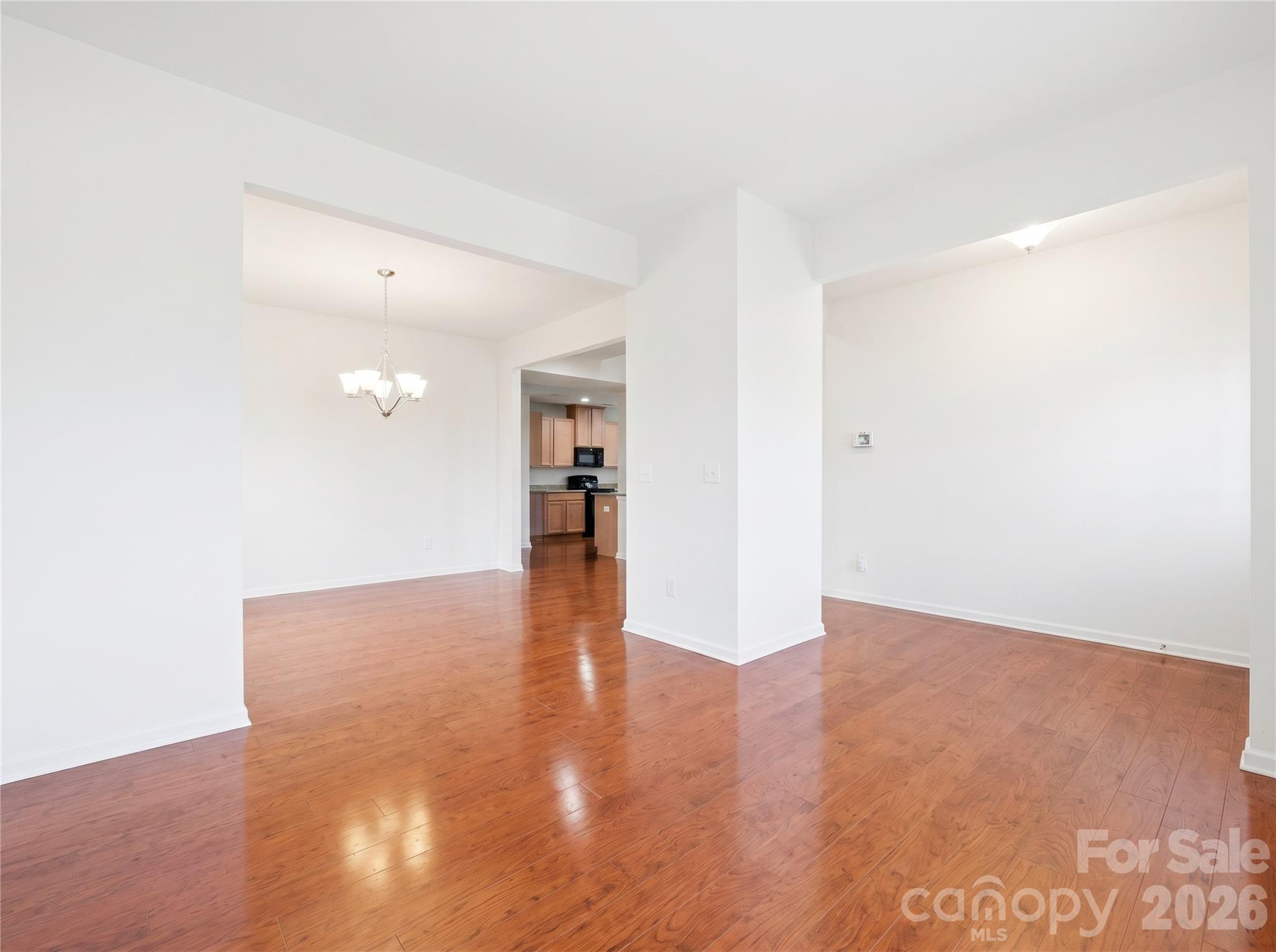 Office/Flex Room: Dedicated main-level flex space ideal for a home office, study area, playroom, or hobby room. - 3341 Linetender Drive, Davidson