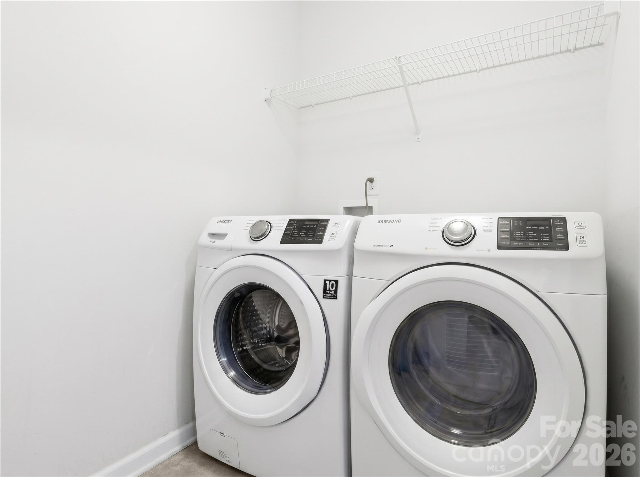 Laundry Room: Dedicated laundry room with shelving and space for full-size appliances. Washer and Dryer Included - 3341 Linetender Drive, Davidson