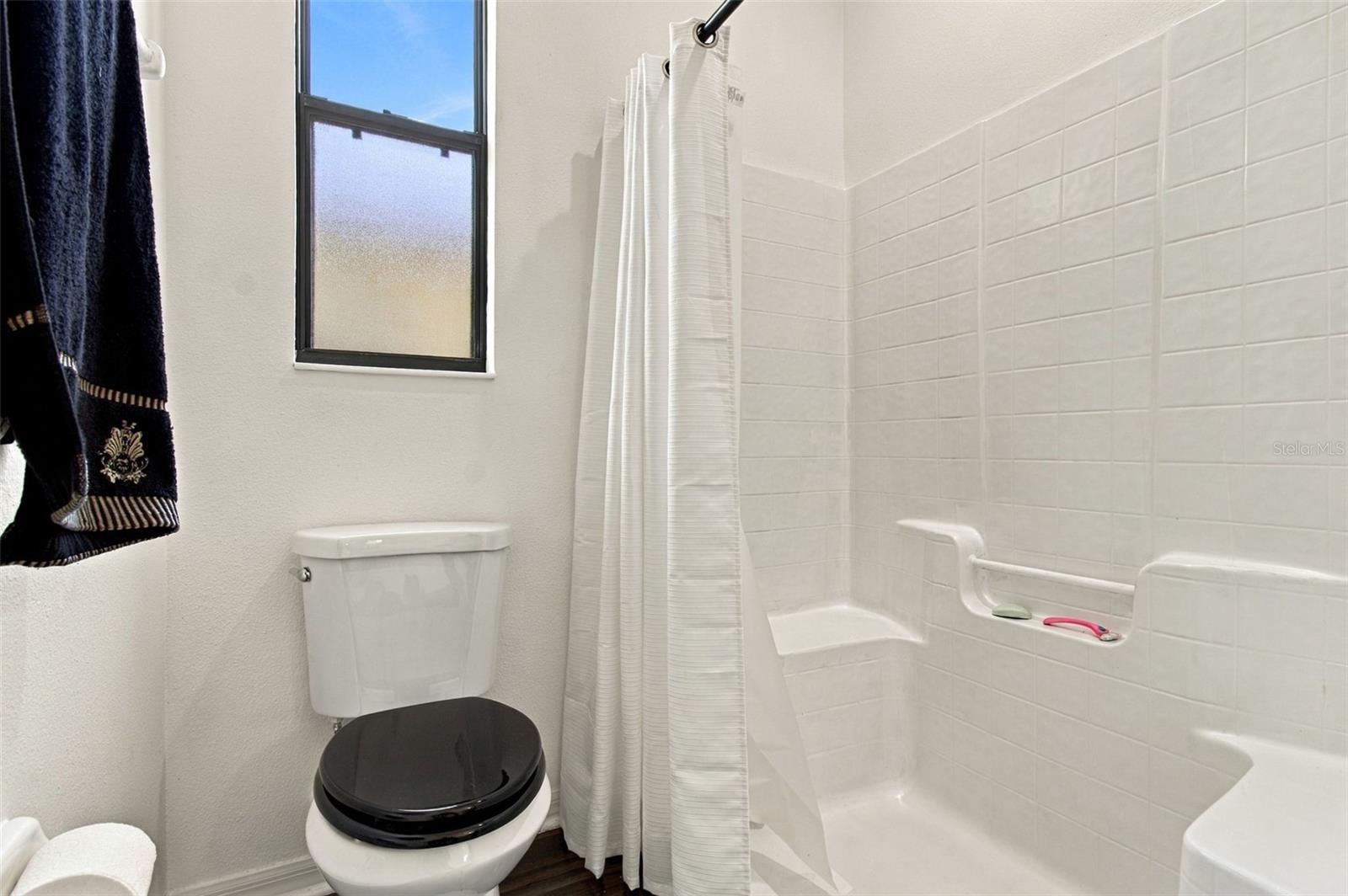 Walk-in shower with seat - 884 GRAND CANAL DR, KISSIMMEE