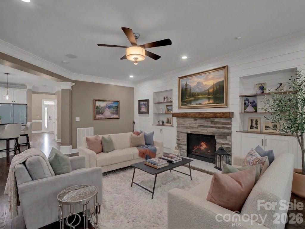 Living room virtually staged with AI-generated furniture - 2652 Bedford Place NW, Concord